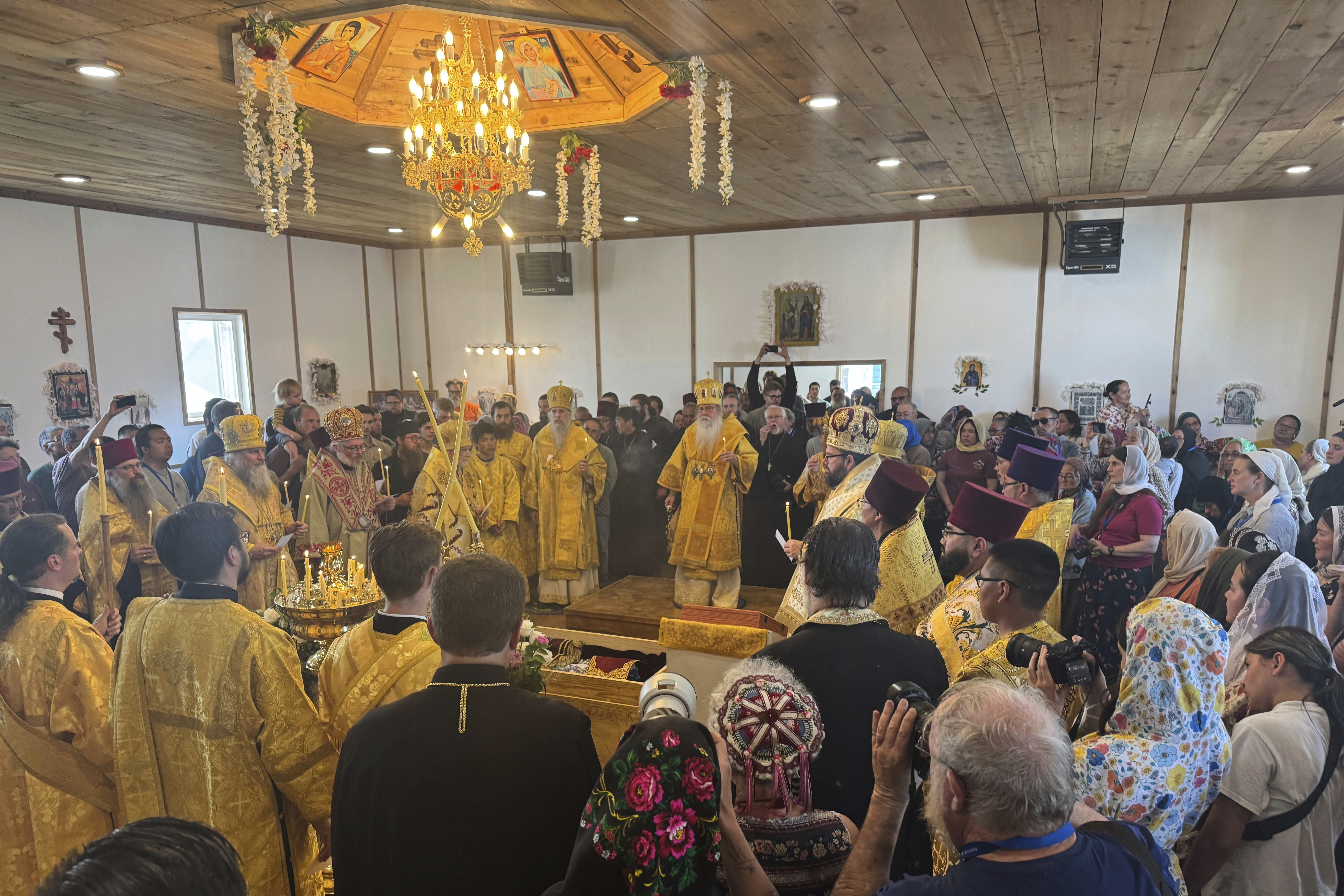 Worshippers fill St. Nicholas Orthodox Church in Kwethluk, Alaska, on June 19, 2025, for the canonization ceremony of St. Olga, the first female Orthodox saint in North America. (AP Photo/Mark Thiessen)