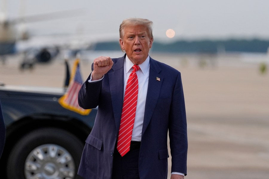 President Donald Trump gestures after arriving on Air Force One, Wednesday, June 25, 2025, at Joint Base Andrews, Md. (AP Photo/Alex Brandon)