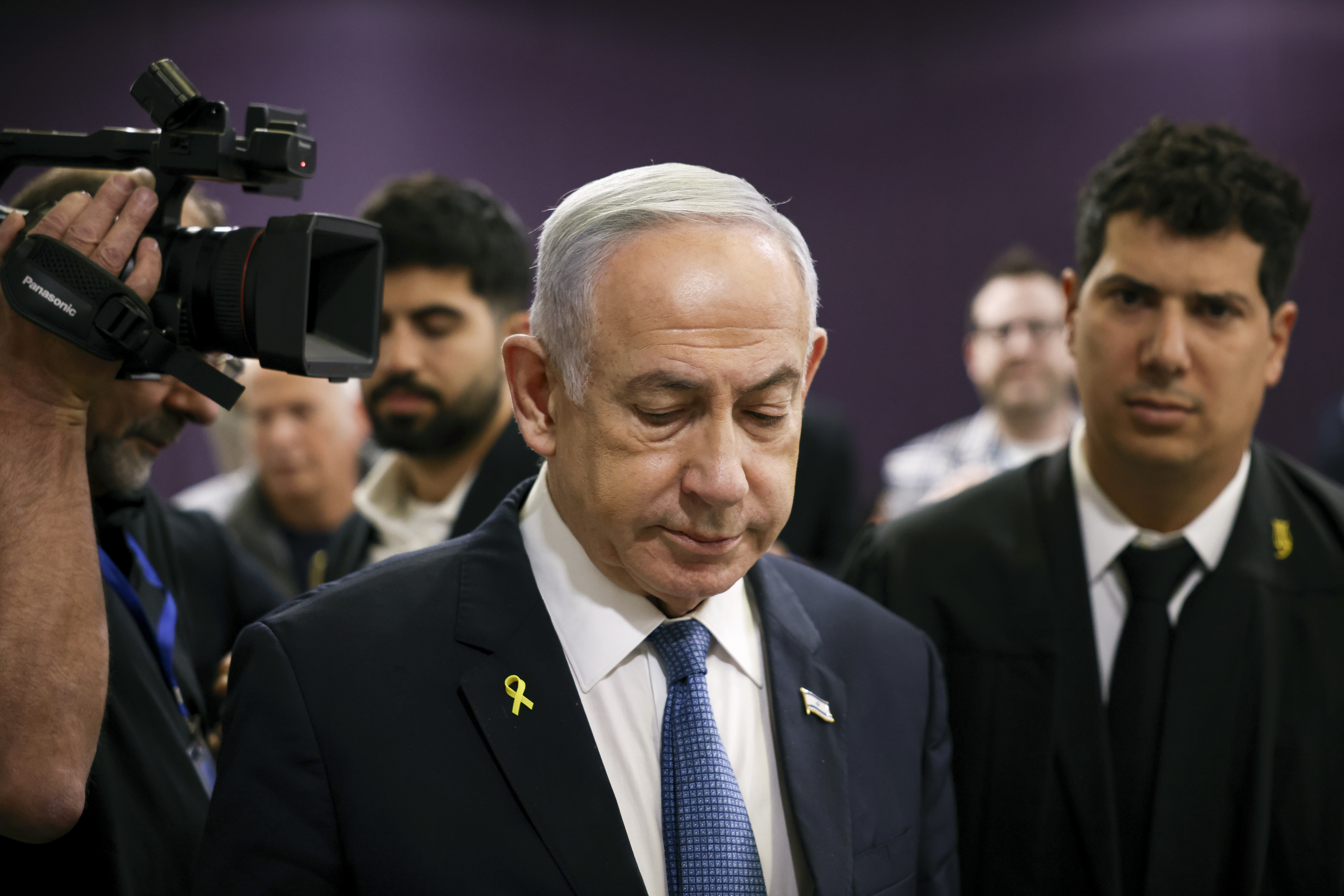 FILE - Israeli Prime Minister Benjamin Netanyahu attends his trial where he faces corruption charges at the district court in Tel Aviv, Israel, Dec. 16, 2024. (Stoyan Nenov/Pool Photo via AP, File)