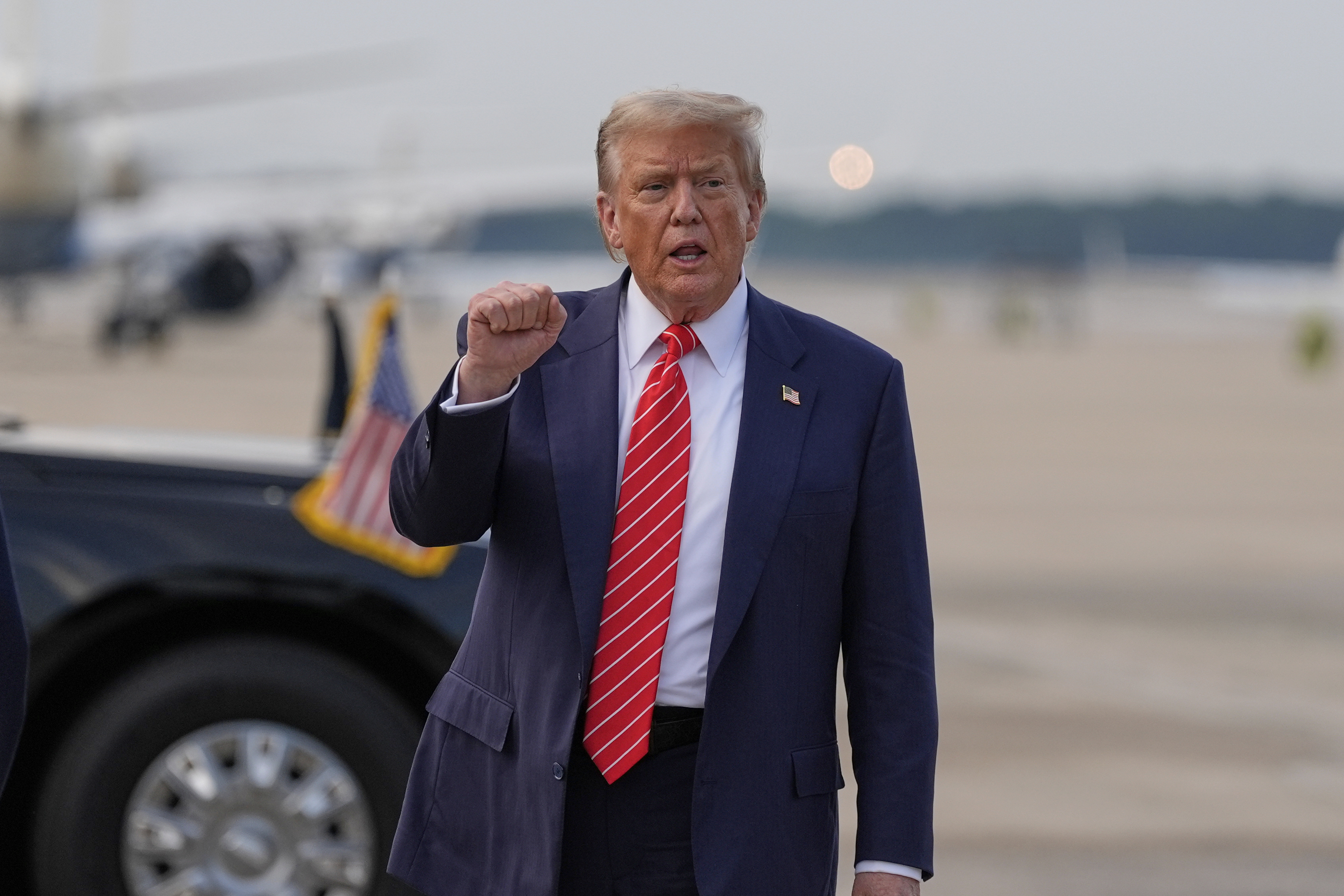President Donald Trump gestures after arriving on Air Force One, Wednesday, June 25, 2025, at Joint Base Andrews, Md. (AP Photo/Alex Brandon)