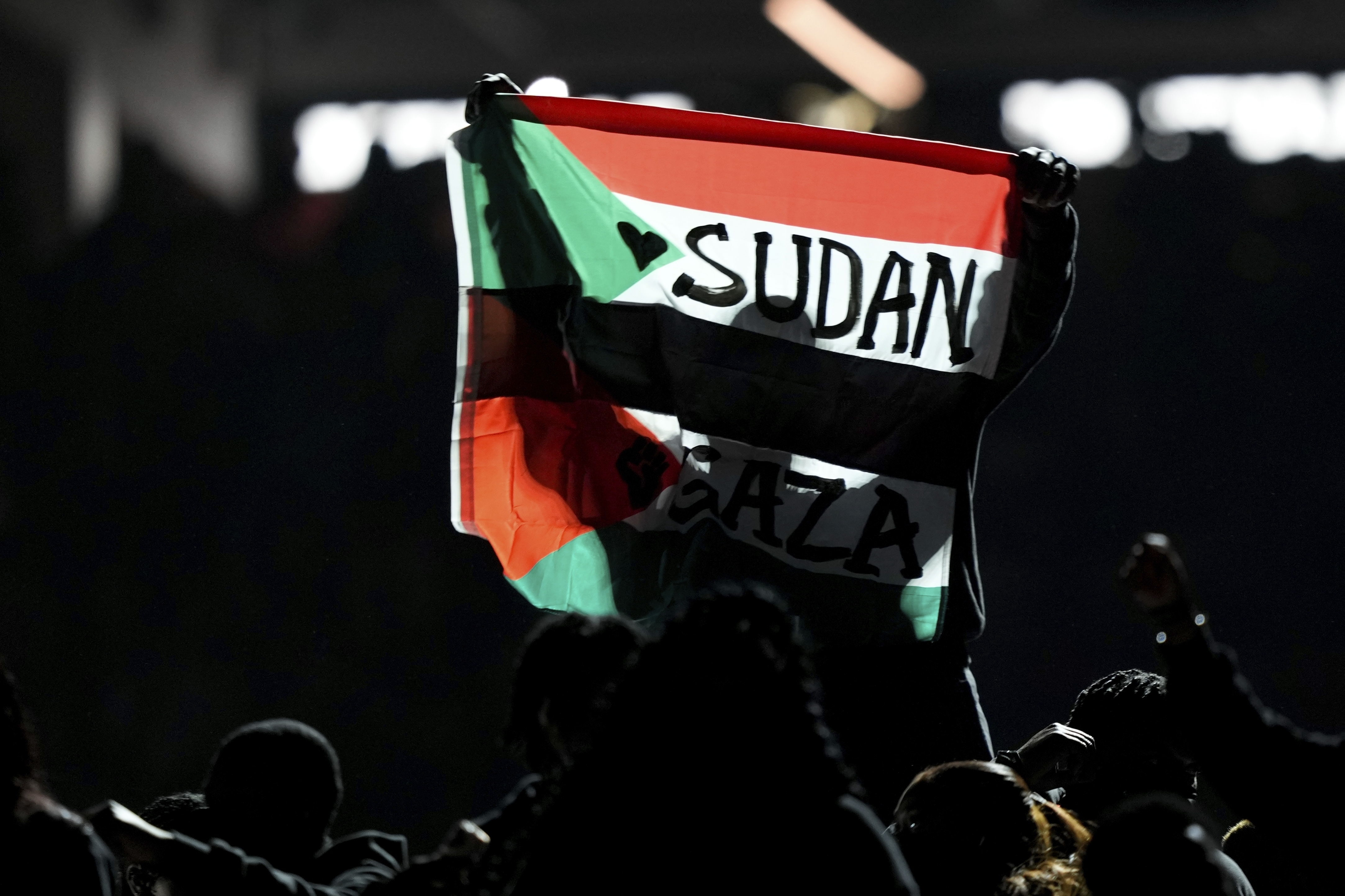FILE - A flag is raised during halftime of the NFL Super Bowl 59 football game between the Kansas City Chiefs and the Philadelphia Eagles, Feb. 9, 2025, in New Orleans. (AP Photo/Matt Slocum, File)
