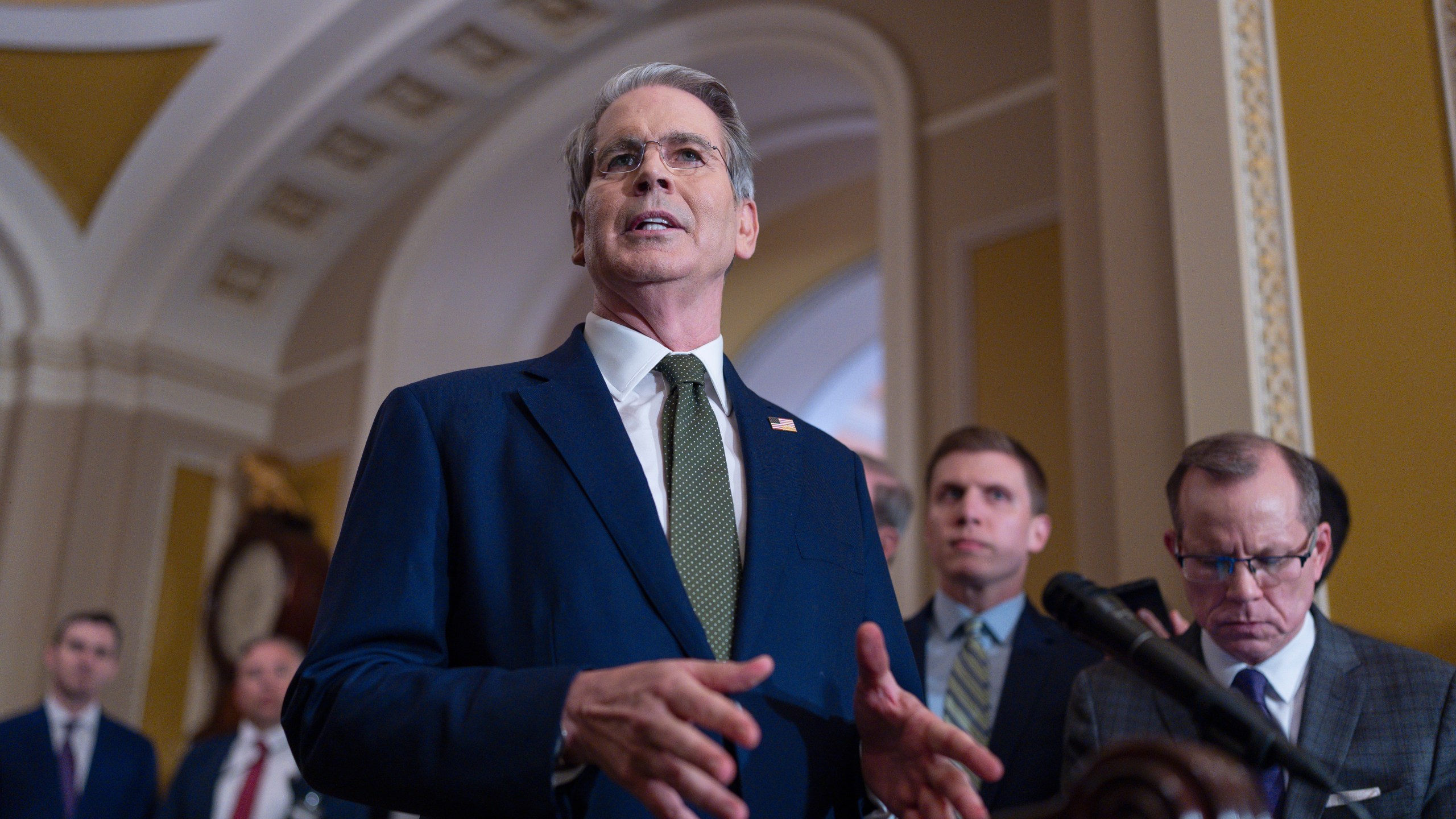 Treasury Secretary Scott Bessent talks to reporters about his lunch meeting with Republican senators and the schedule for getting the Republican megabill to President Donald Trump's desk by July 4, at the Capitol in Washington, Tuesday, June 24, 2025. (AP Photo/J. Scott Applewhite)