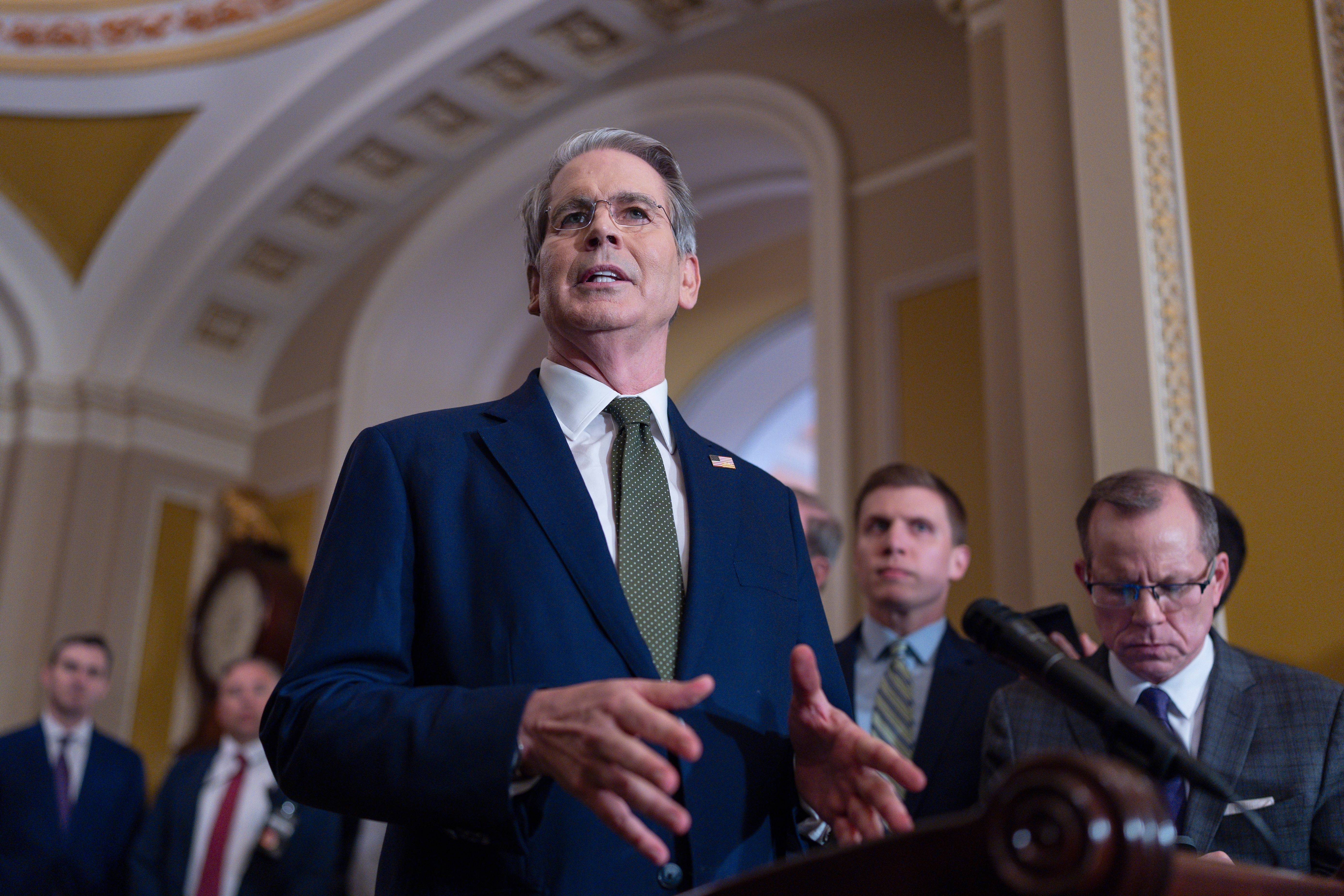 Treasury Secretary Scott Bessent talks to reporters about his lunch meeting with Republican senators and the schedule for getting the Republican megabill to President Donald Trump's desk by July 4, at the Capitol in Washington, Tuesday, June 24, 2025. (AP Photo/J. Scott Applewhite)