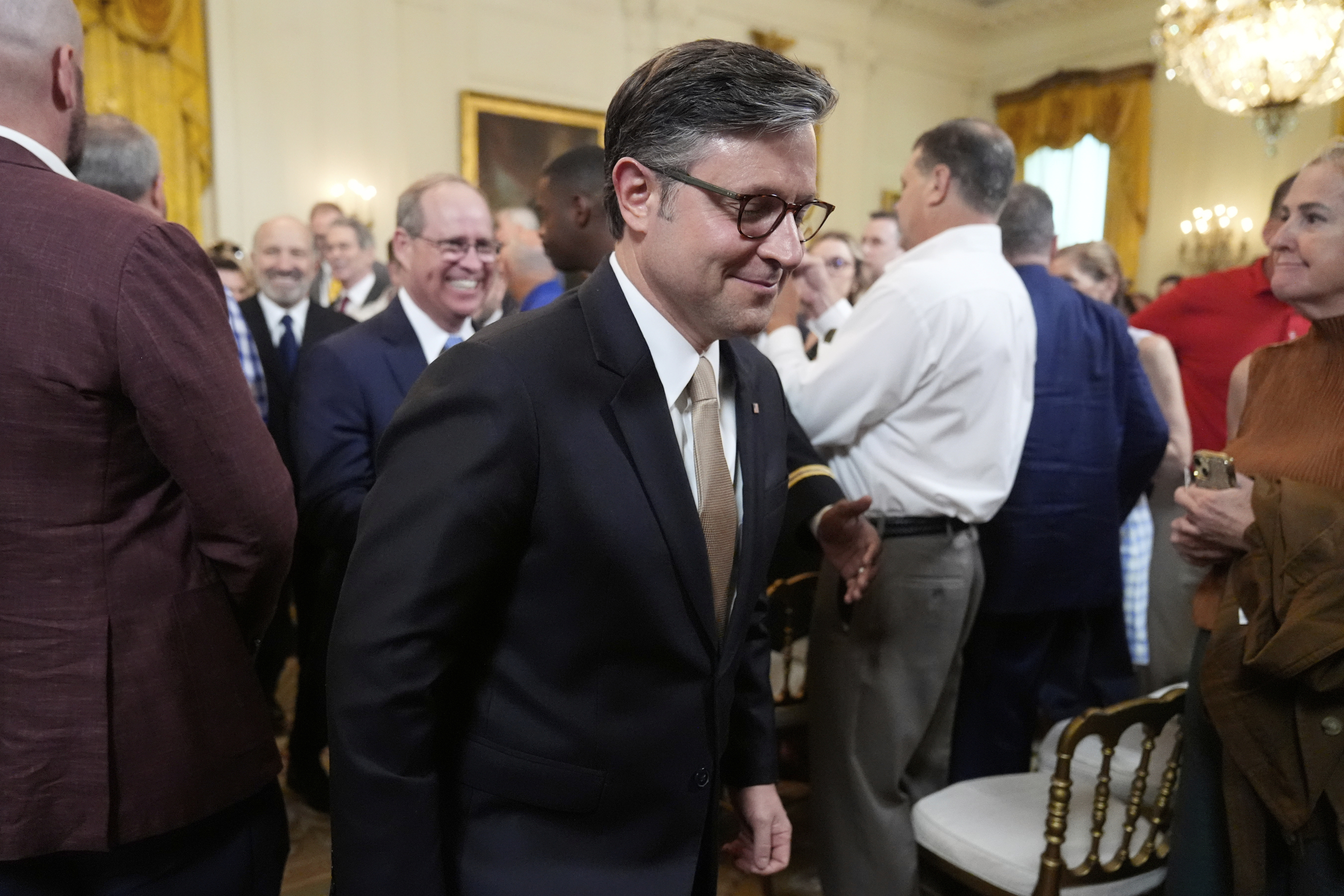House Speaker Mike Johnson, R-La., departs an event to promote President Donald Trump's domestic policy and budget agenda in the East Room of the White House, Thursday, June 26, 2025, in Washington. (AP Photo/Mark Schiefelbein)