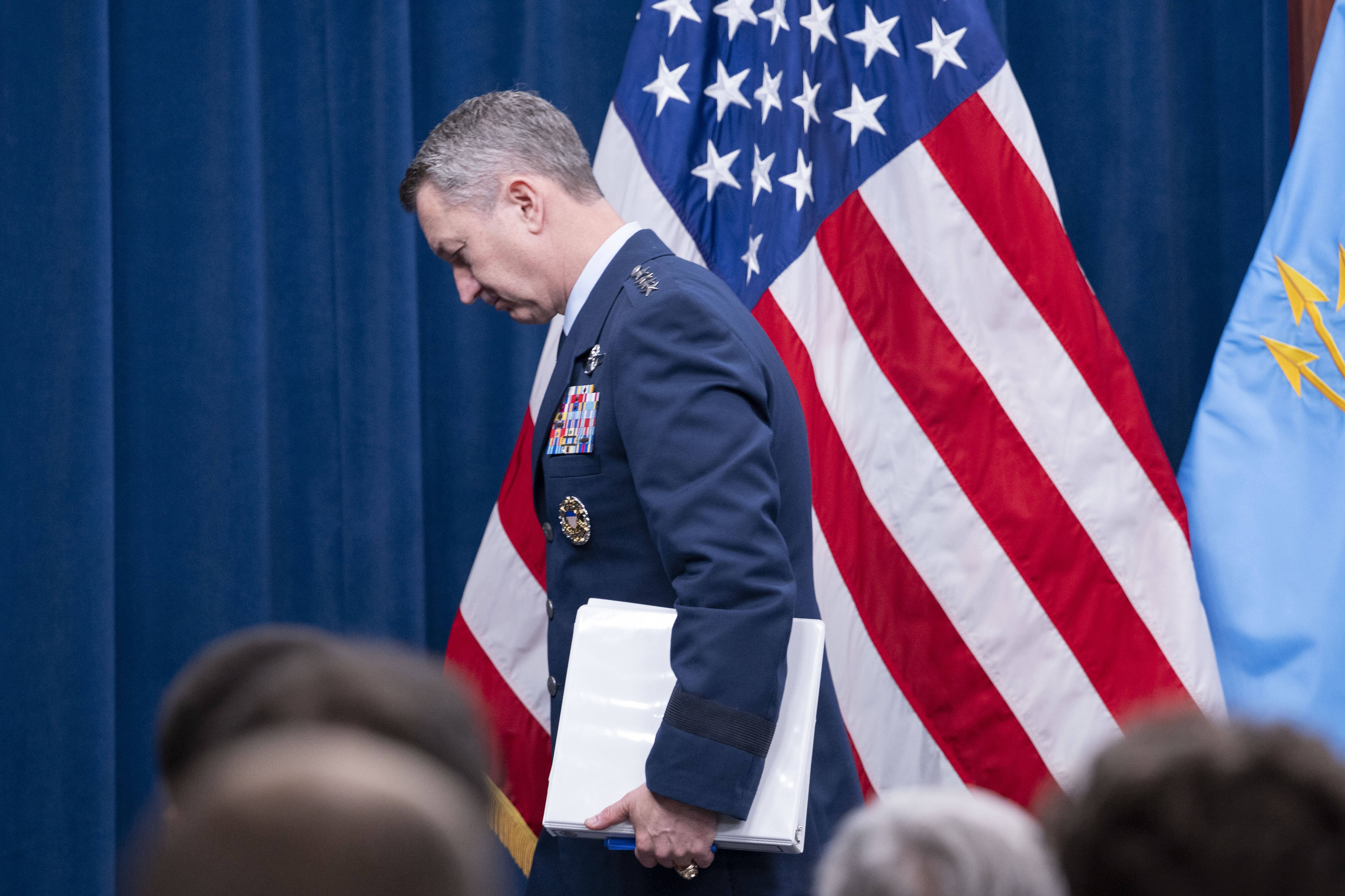 Joint Chiefs Chairman Gen. Dan Caine steps away from the podium following a news conference at the Pentagon, Thursday, June 26, 2025 in Washington. (AP Photo/Kevin Wolf)