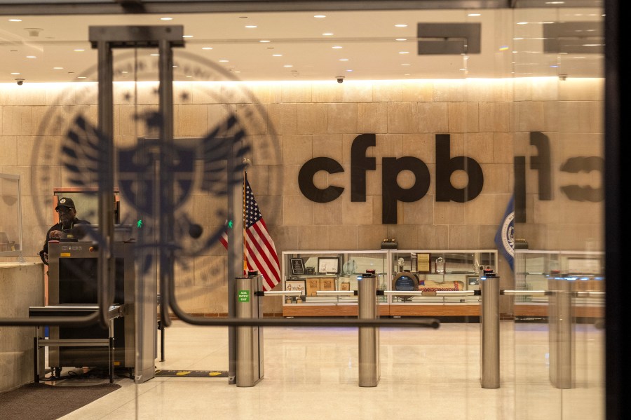 FILE - A security officer works inside of the Consumer Financial Protection Bureau (CFPB) building headquarters, Feb. 10, 2025, in Washington. (AP Photo/Jacquelyn Martin, File)