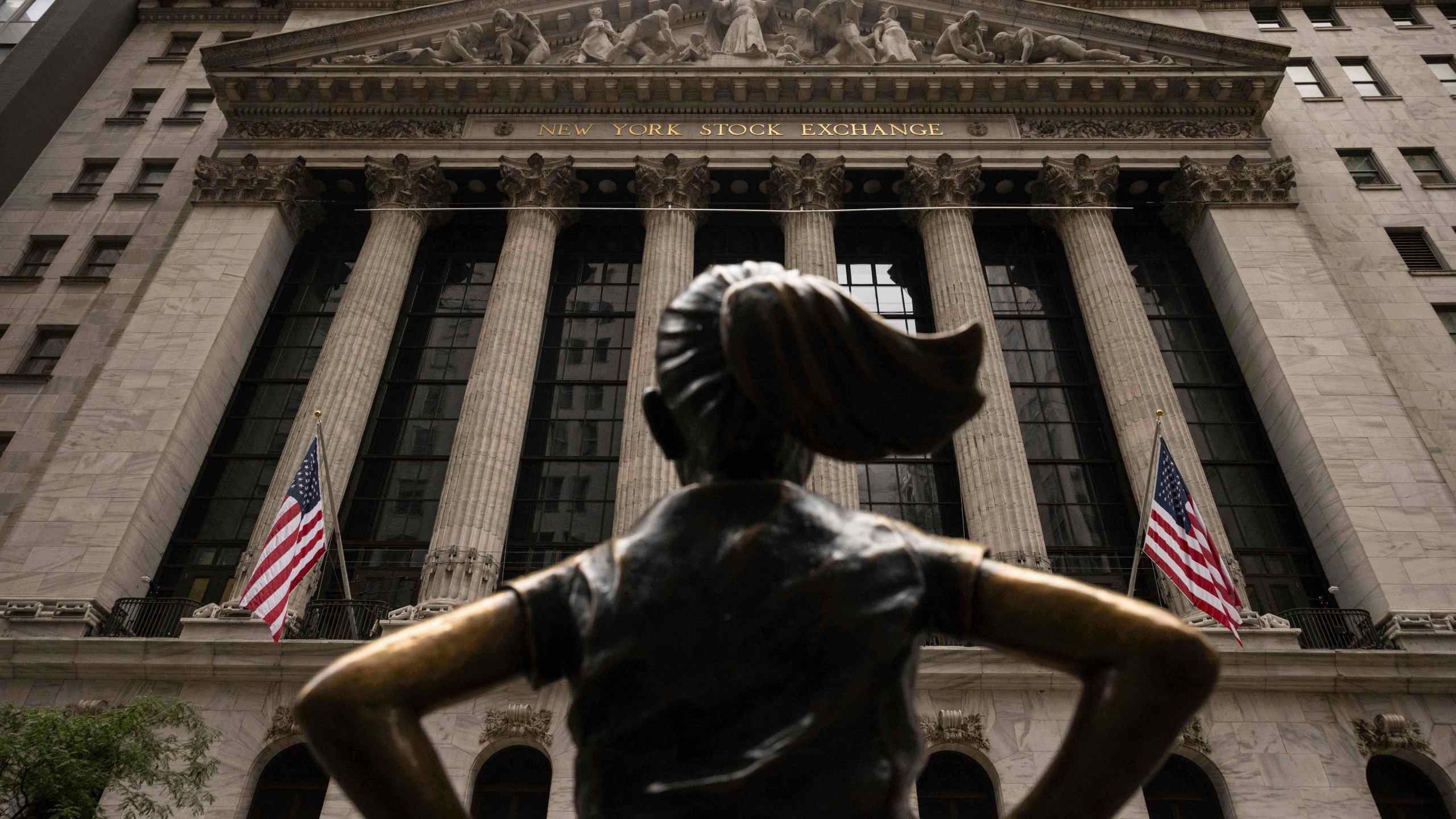 The "Fearless Girl" statue stands in front of the New York Stock Exchange, Wednesday, June 18, 2025, in New York. (AP Photo/Yuki Iwamura)