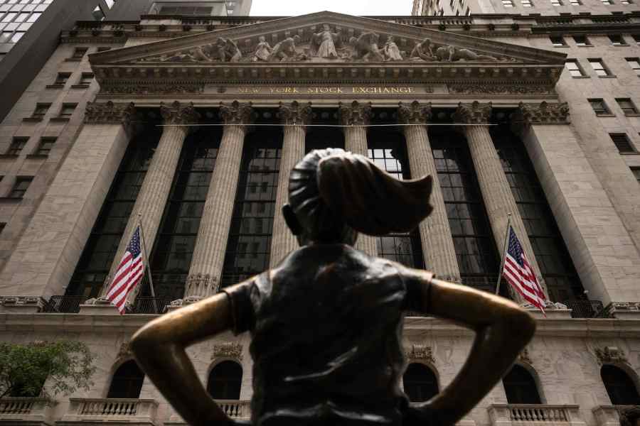 The "Fearless Girl" statue stands in front of the New York Stock Exchange, Wednesday, June 18, 2025, in New York. (AP Photo/Yuki Iwamura)