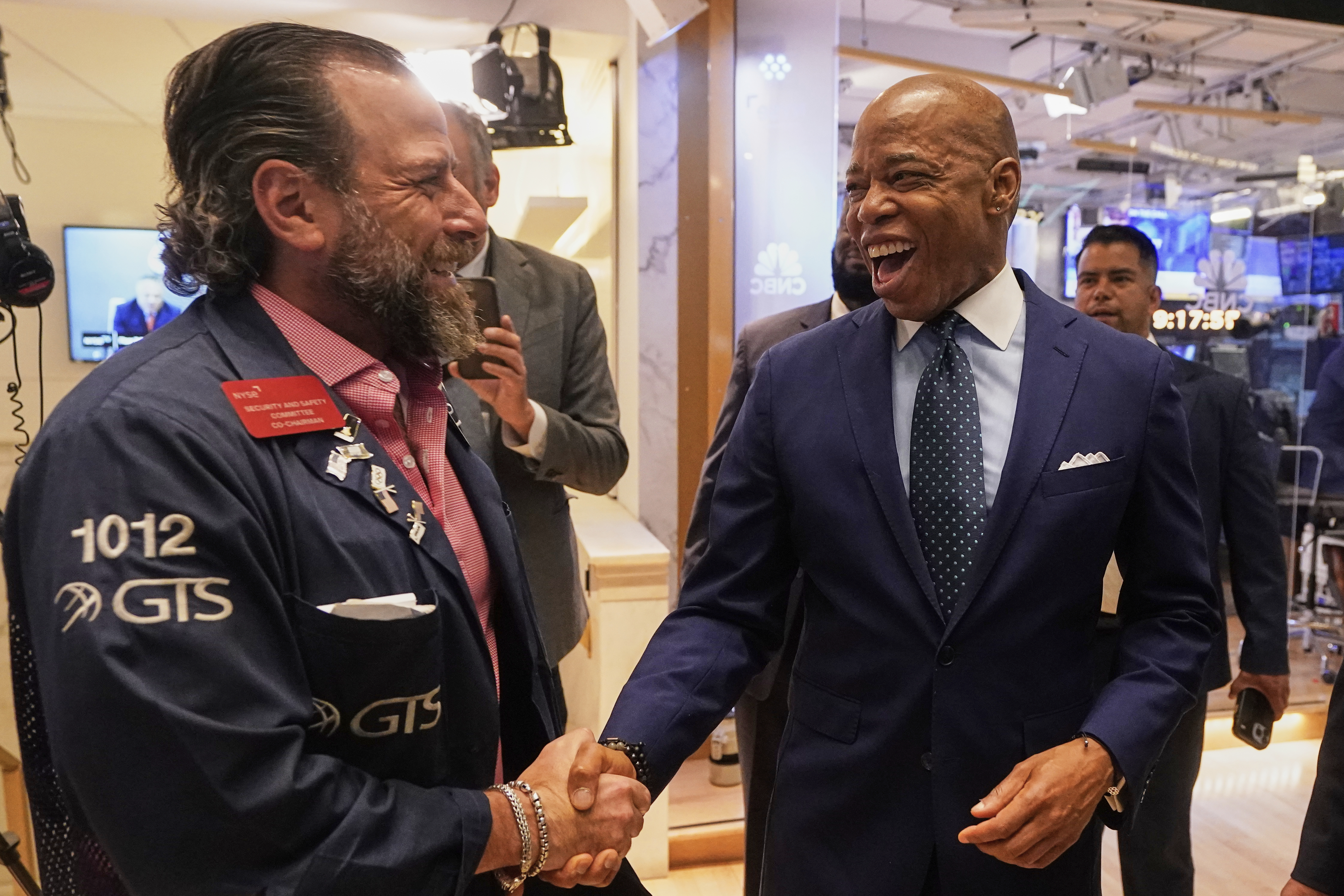 Trader Michael Pistillo, left, meets New York Mayor Eric Adams on the floor of the New York Stock Exchange after Adams was interviewed on CNBC, Friday, June 27, 2025. (AP Photo/Richard Drew)