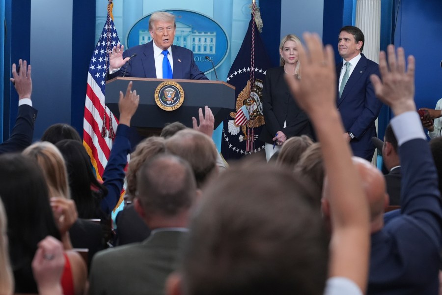 President Donald Trump, from left, speaks to the media as Attorney General Pam Bondi and Deputy Attorney General Todd Blance listen, Friday, June 27, 2025, in the briefing room of the White House in Washington. (AP Photo/Jacquelyn Martin)