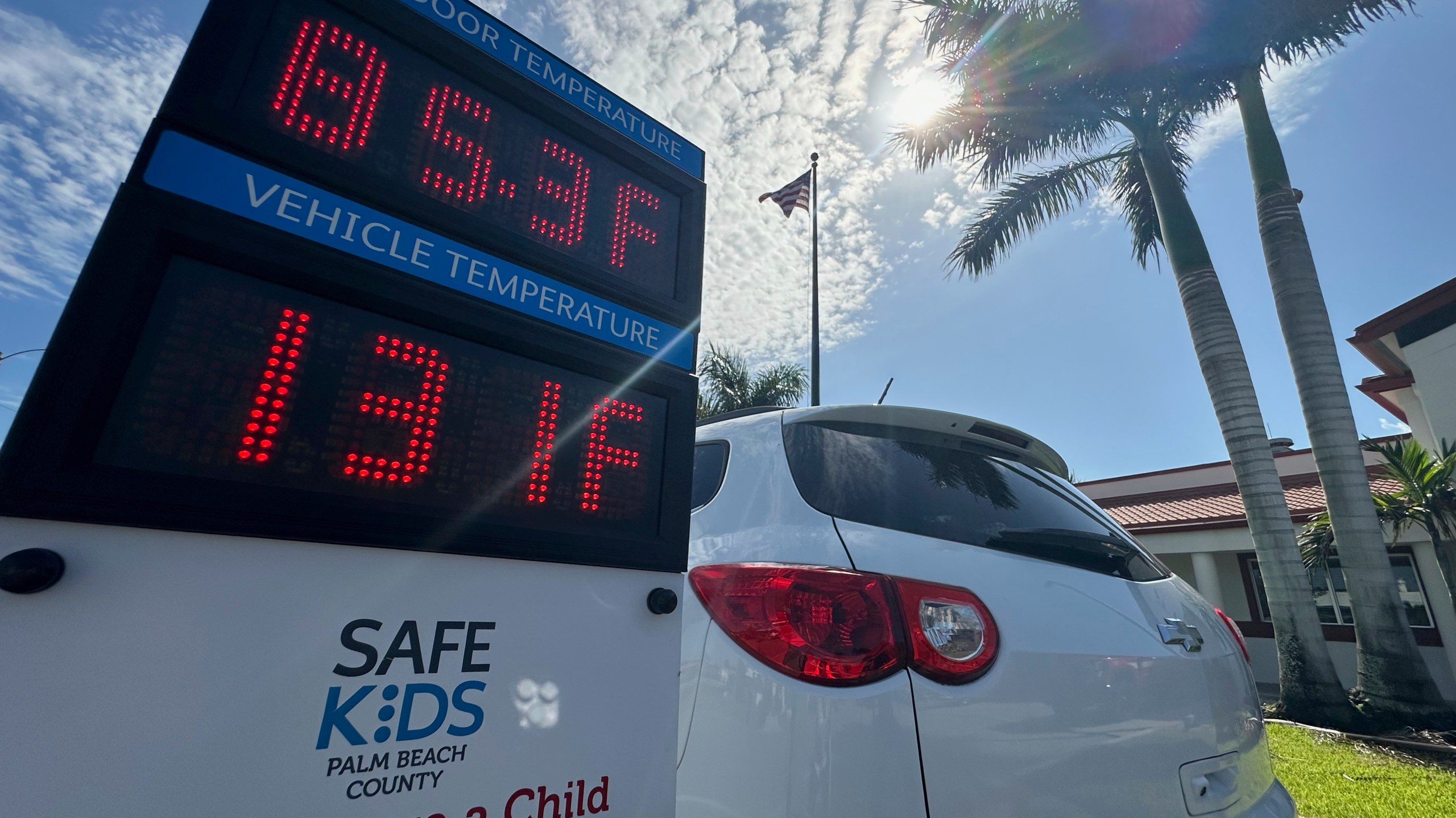 Outside temperature is displayed in comparison to the inside temperature of a vehicle on Thursday June 26, 2025 in Belle Glade, Fla. during an event to raise awareness about the dangers of leaving children unattended in vehicles. (AP Photo/Cody Jackson)