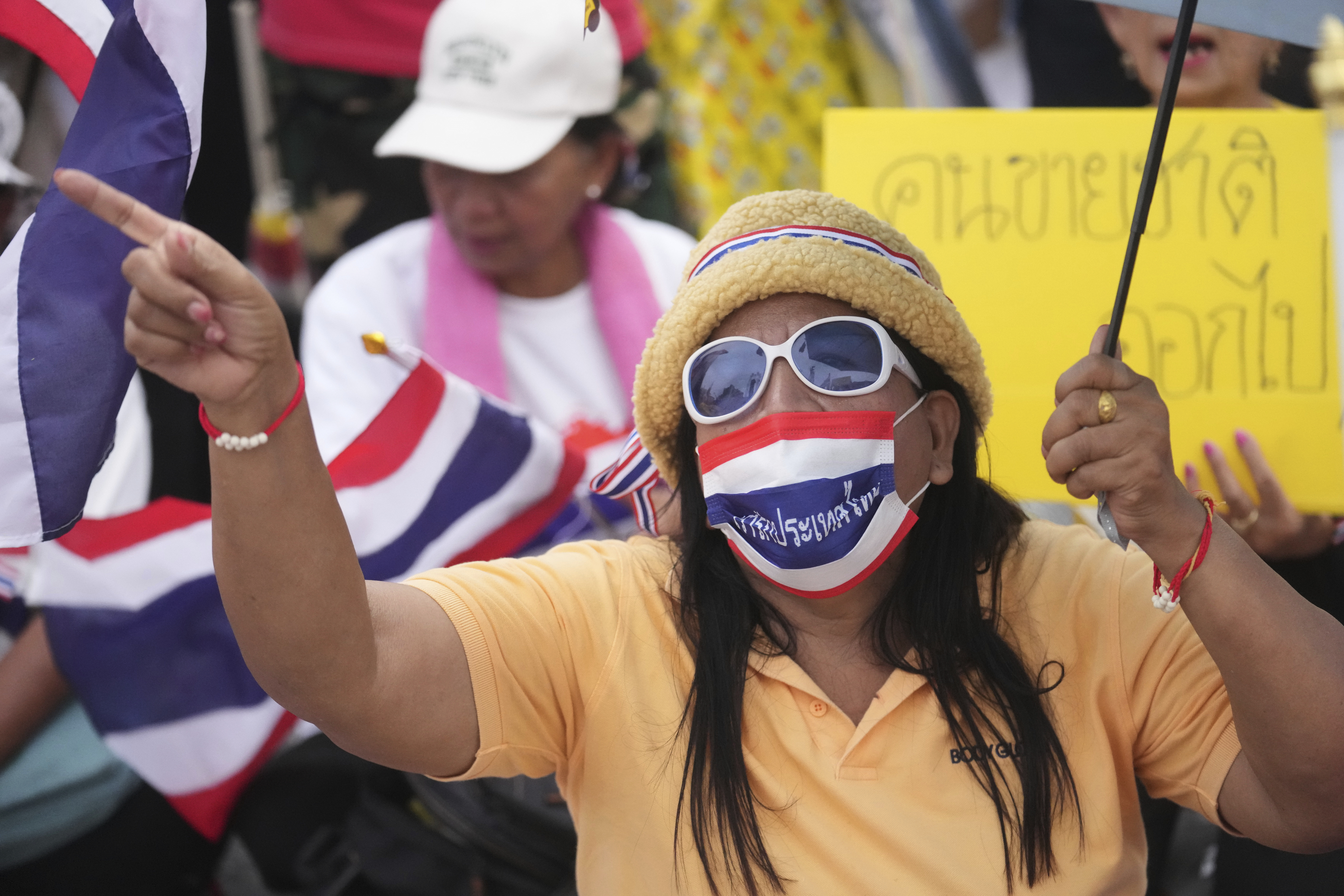 Protesters gather at Victory Monument demanding Thailand's Prime Minister Paetongtarn Shinawatra resign in Bangkok, Thailand, Saturday, June 28, 2025. (AP Photo/Sakchai Lalit)
