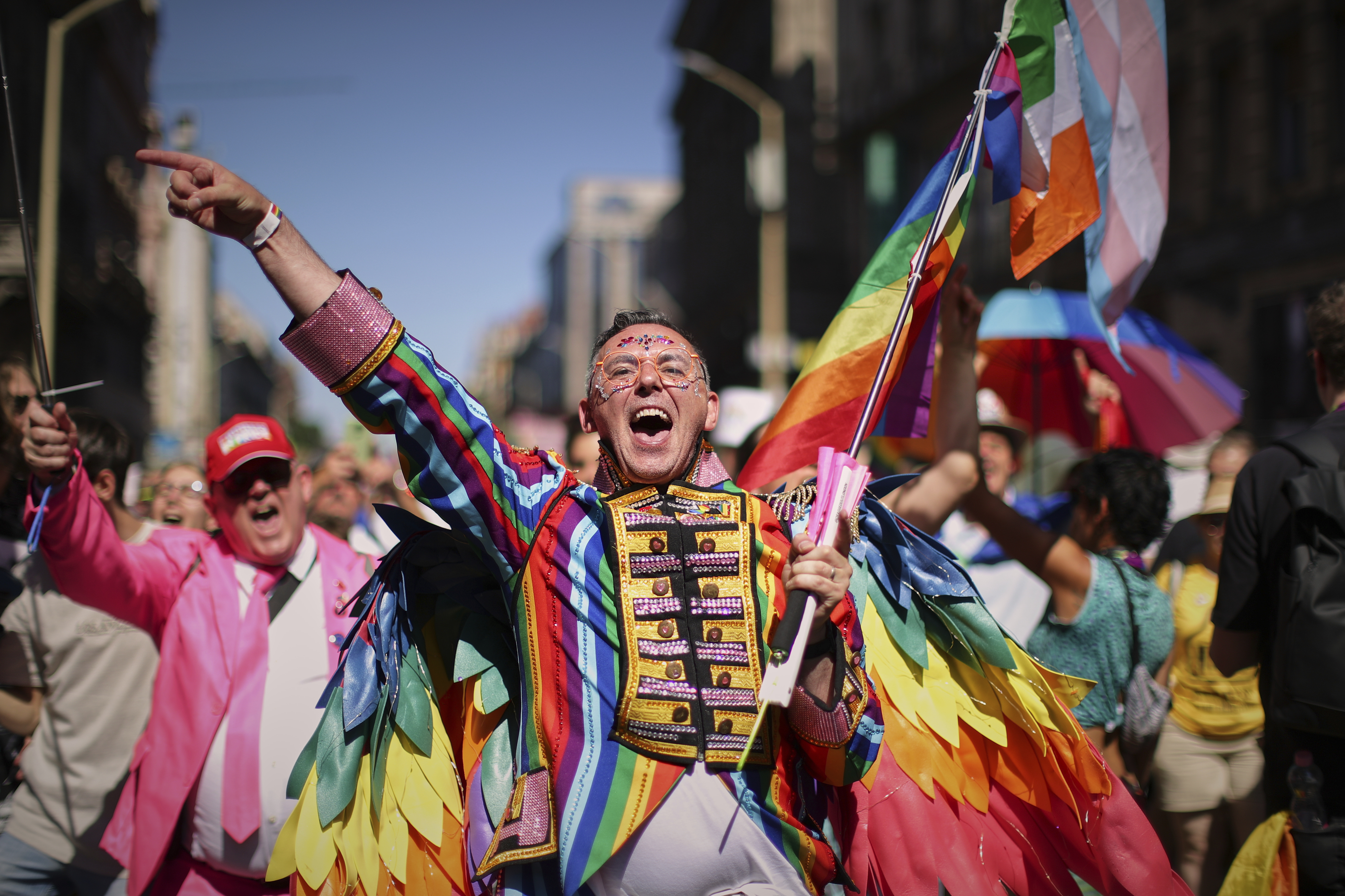 A participant in the Pride march cheers in Budapest, Hungary, Saturday, June 28, 2025. (AP Photo/Rudolf Karancsi)