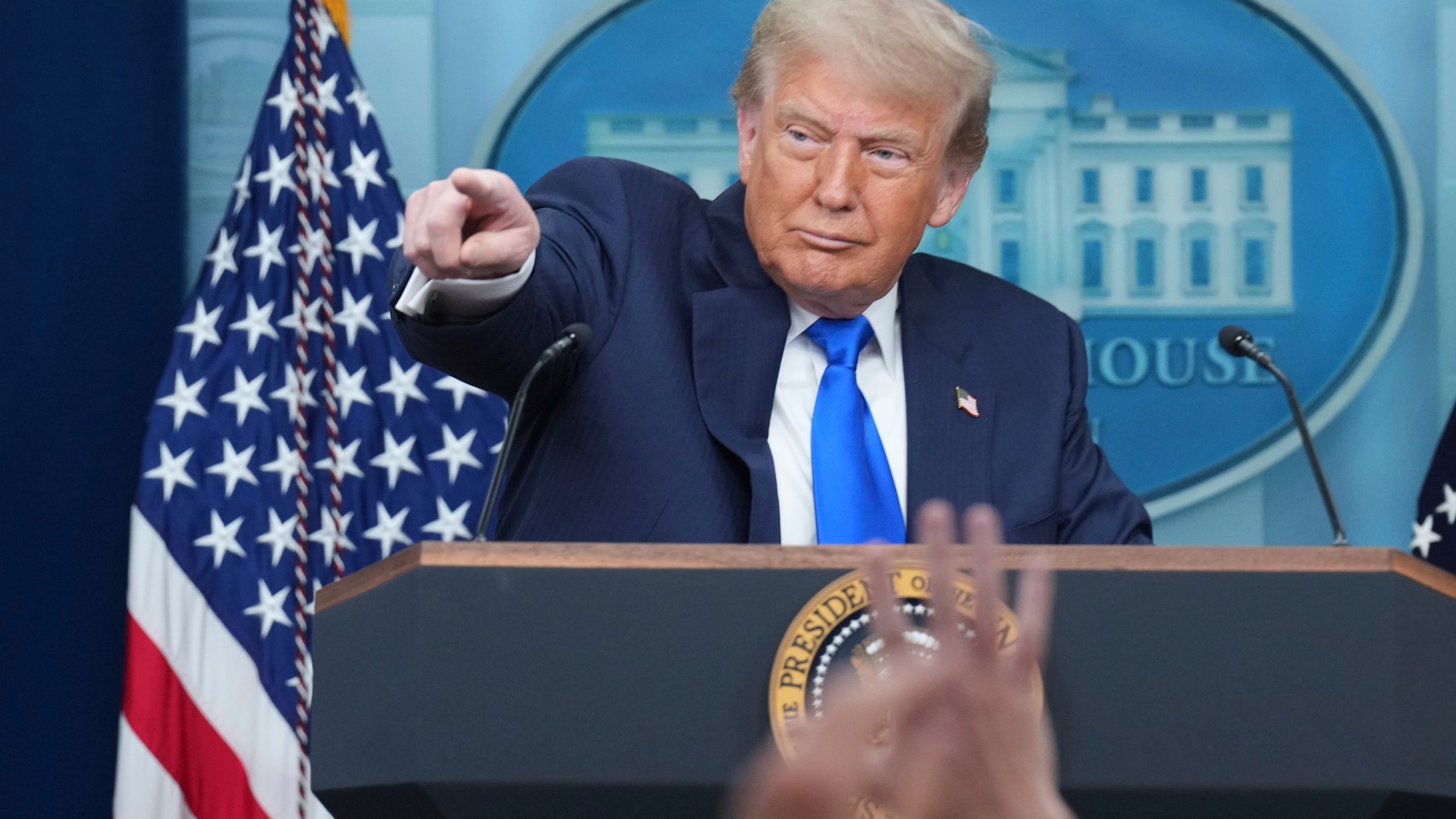 President Donald Trump points to a reporter to take a question as he speaks to the media, Friday, June 27, 2025, in the briefing room of the White House in Washington. (AP Photo/Jacquelyn Martin)