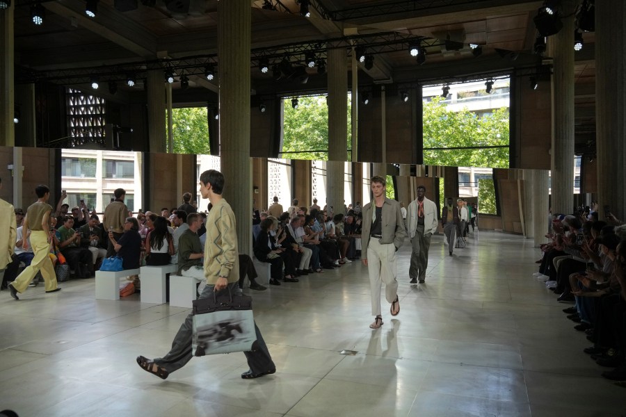 Models wear creations as part of the men's Hermes Spring-Summer 2026 collection, that was presented in Paris Saturday, June 28, 2025. (AP Photo/Michel Euler)