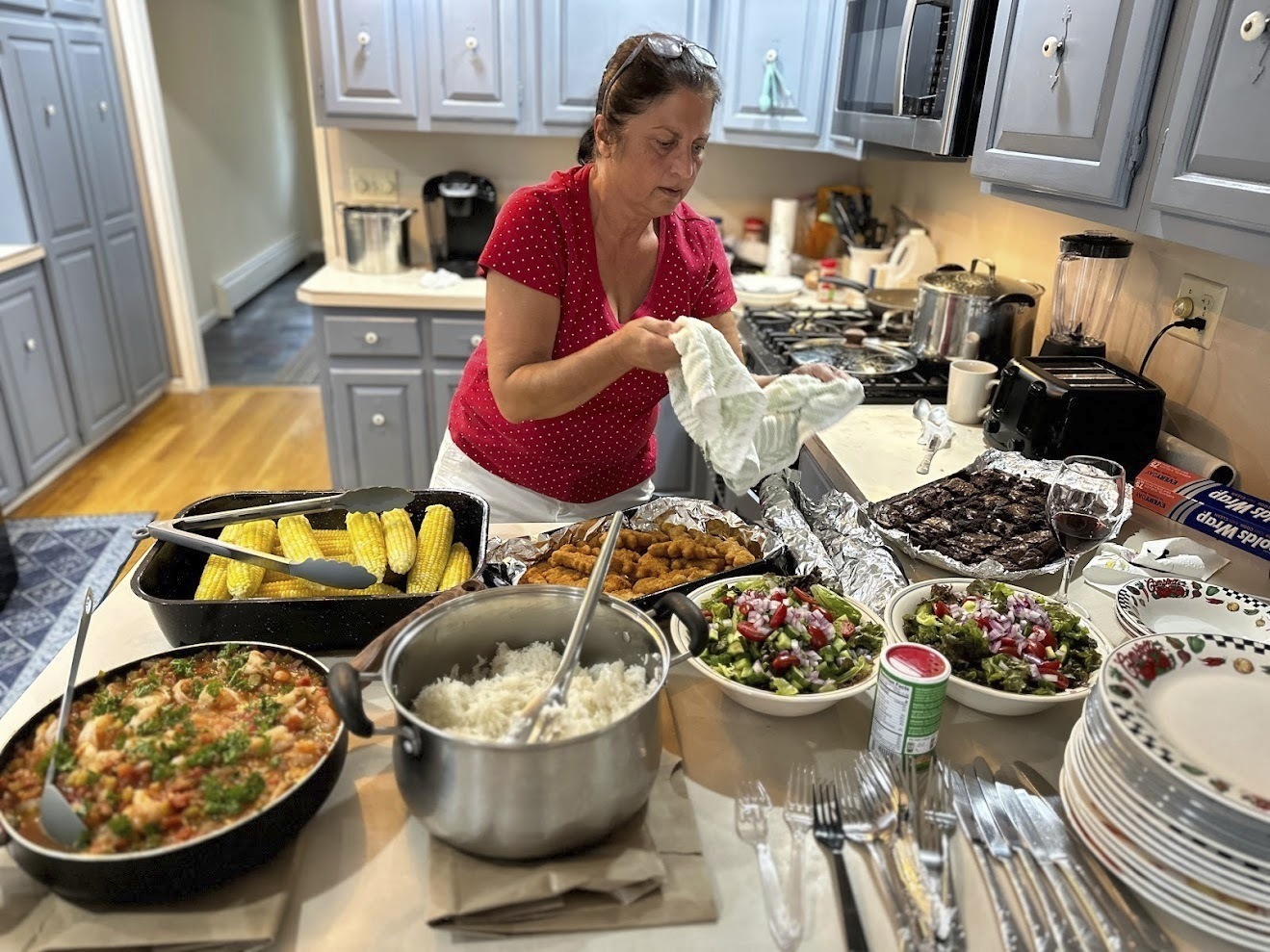In this undated photo provided by her daughter, Mandonna "Donna" Kashanian, 64, prepares a meal. (Kaitlynn Milne via AP)