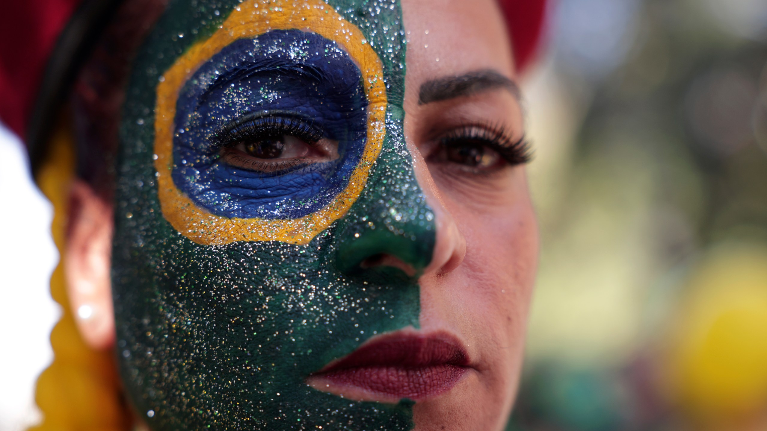 A supporter of former President Jair Bolsonaro attends a protest against his Supreme Court trial, in which he is accused of involvement in a 2022 coup attempt, in Sao Paulo, Sunday, June, 29, 2025. (AP Photo/Ettore Chiereguini)