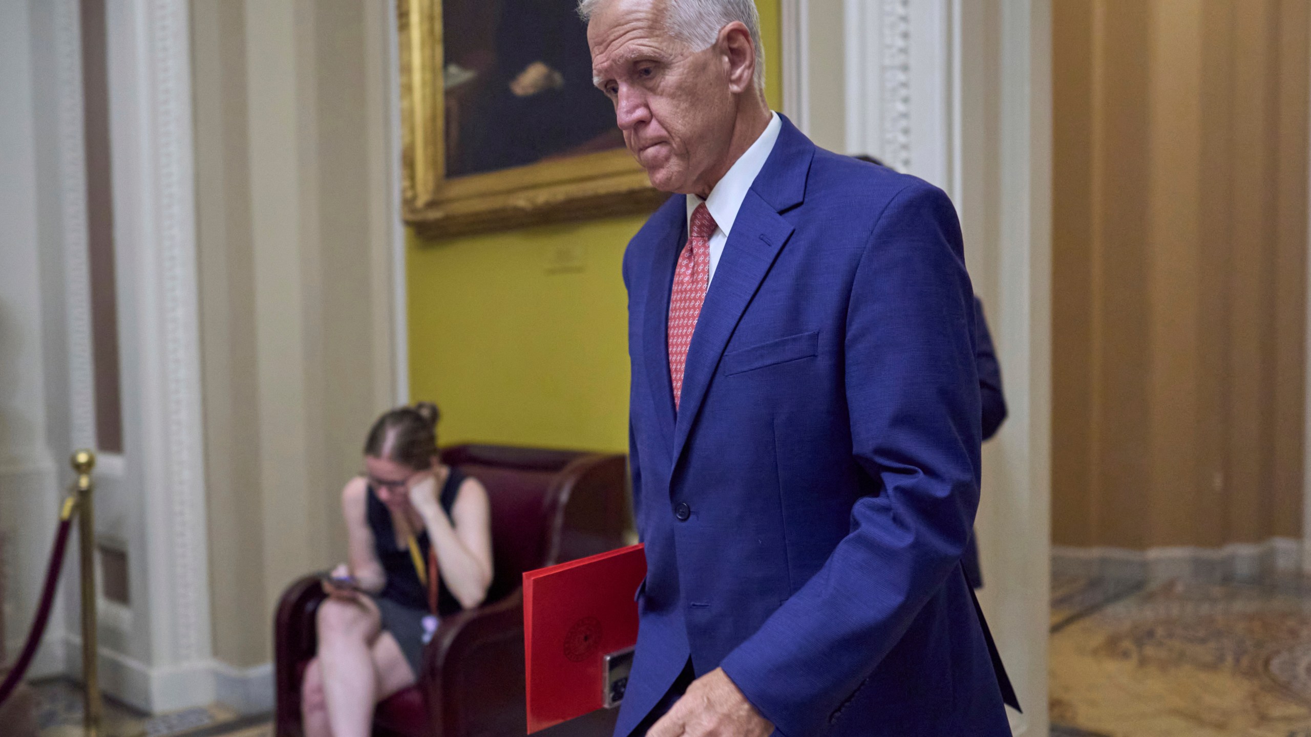 FILE - Sen. Thom Tillis, R-N.C., walks to the chamber as senators arrive for votes and policy meetings, at the Capitol in Washington, June 17, 2025. (AP Photo/J. Scott Applewhite, File)