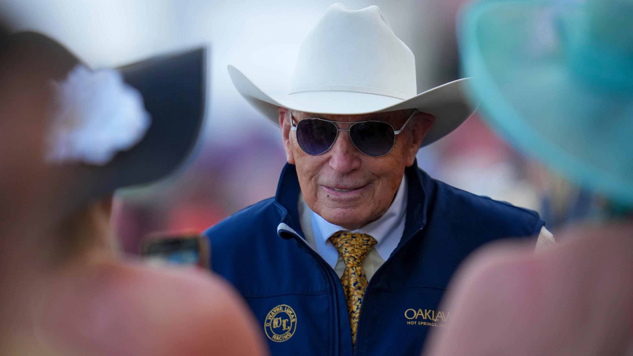 FILE - American Promise trainer D. Wayne Lukas looks on prior to the 150th running of the Preakness Stakes horse race, May 17, 2025, at Pimlico Race Course in Baltimore. (AP Photo/Julio Cortez)