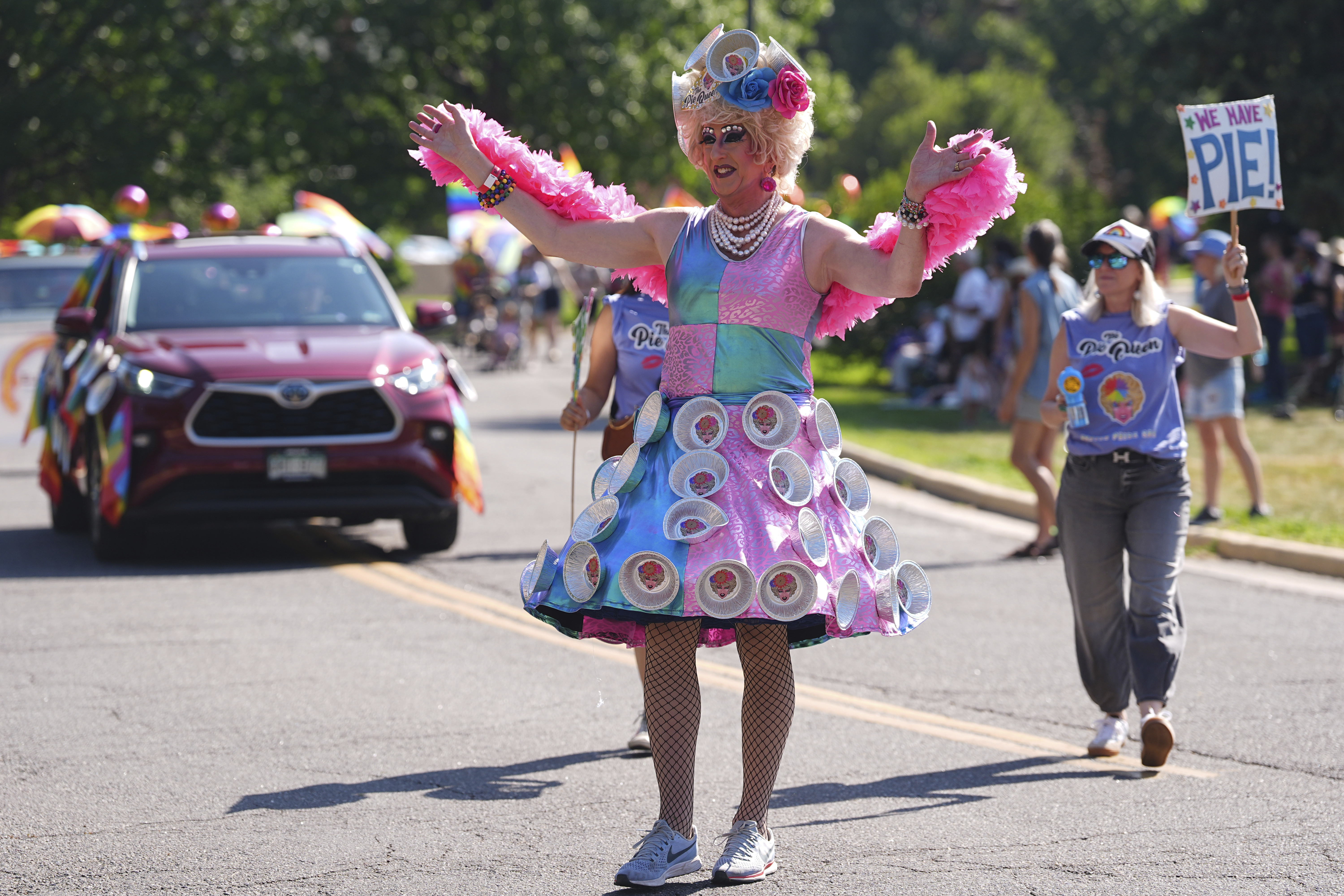 "The Pie Queen" takes part in a parade to celebrate pride month Sunday, June 29, 2025, in Denver. (AP Photo/David Zalubowski)