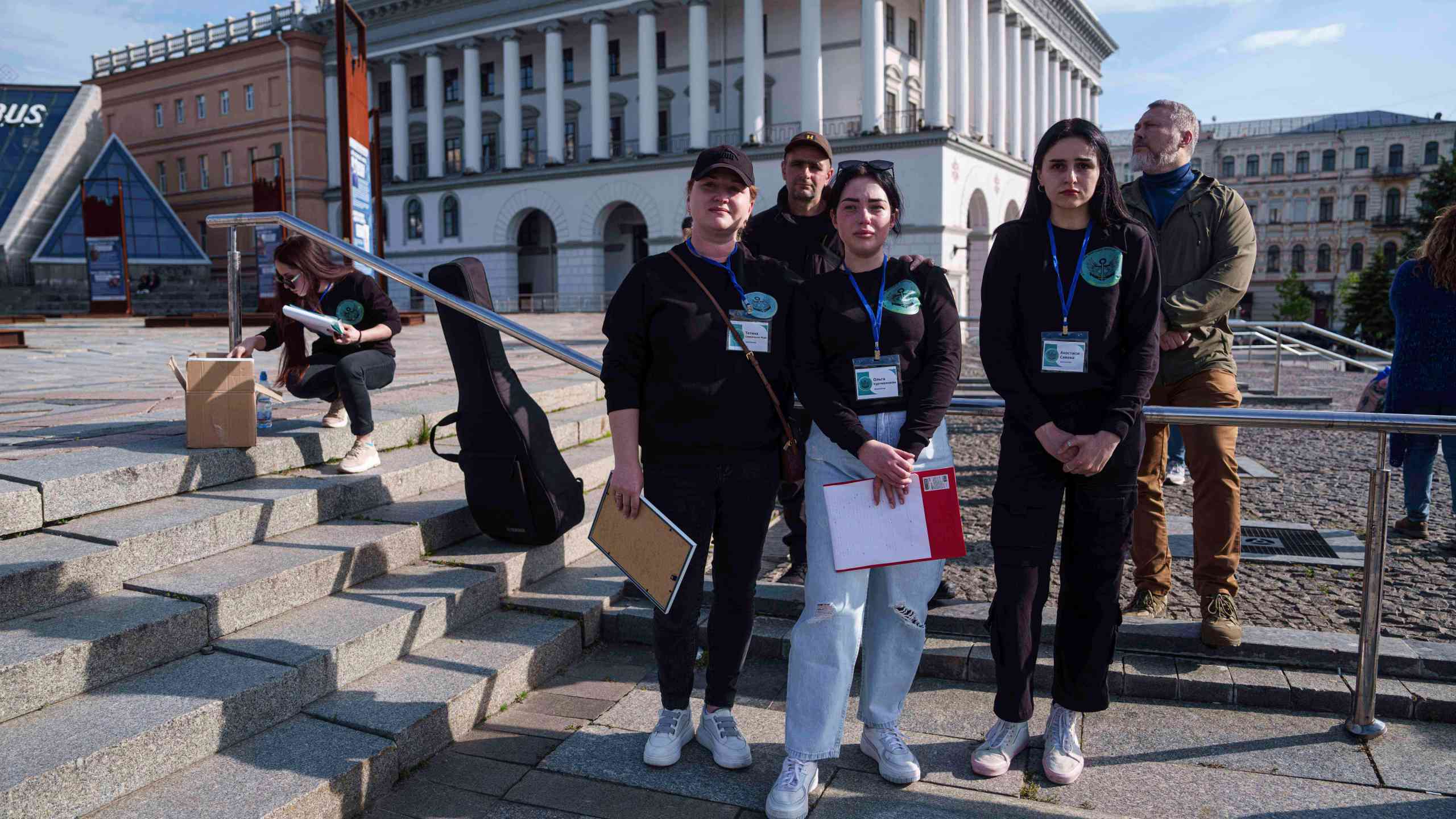 Olha Kurtmalaieva, center, participates a meeting for captive Ukrainian marine soldiers at the Independence square in Kyiv, Ukraine, on Friday, May 23, 2025. (AP Photo/Evgeniy Maloletka)