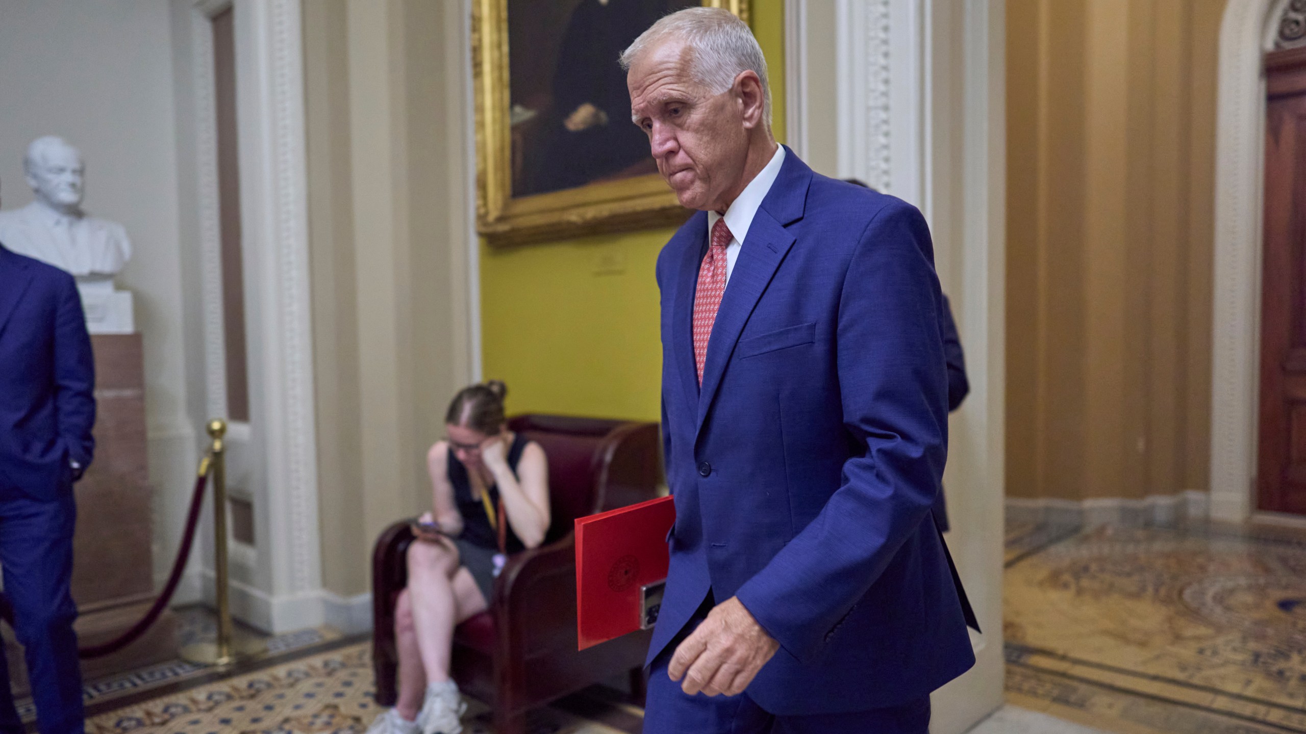 Sen. Thom Tillis, R-N.C., walks to the chamber as senators arrive for votes and policy meetings, at the Capitol in Washington, Tuesday, June 17, 2025. (AP Photo/J. Scott Applewhite)