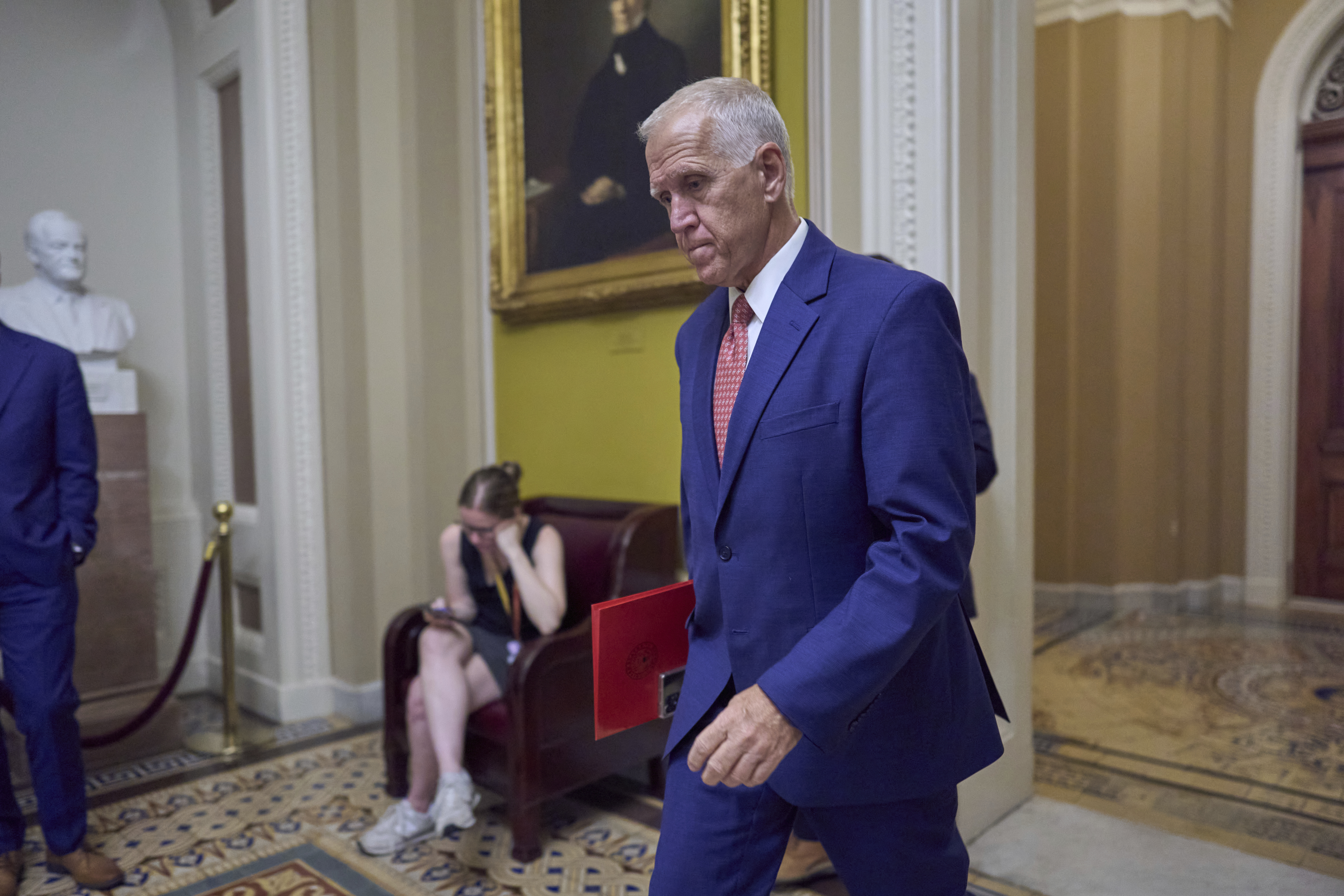 Sen. Thom Tillis, R-N.C., walks to the chamber as senators arrive for votes and policy meetings, at the Capitol in Washington, Tuesday, June 17, 2025. (AP Photo/J. Scott Applewhite)