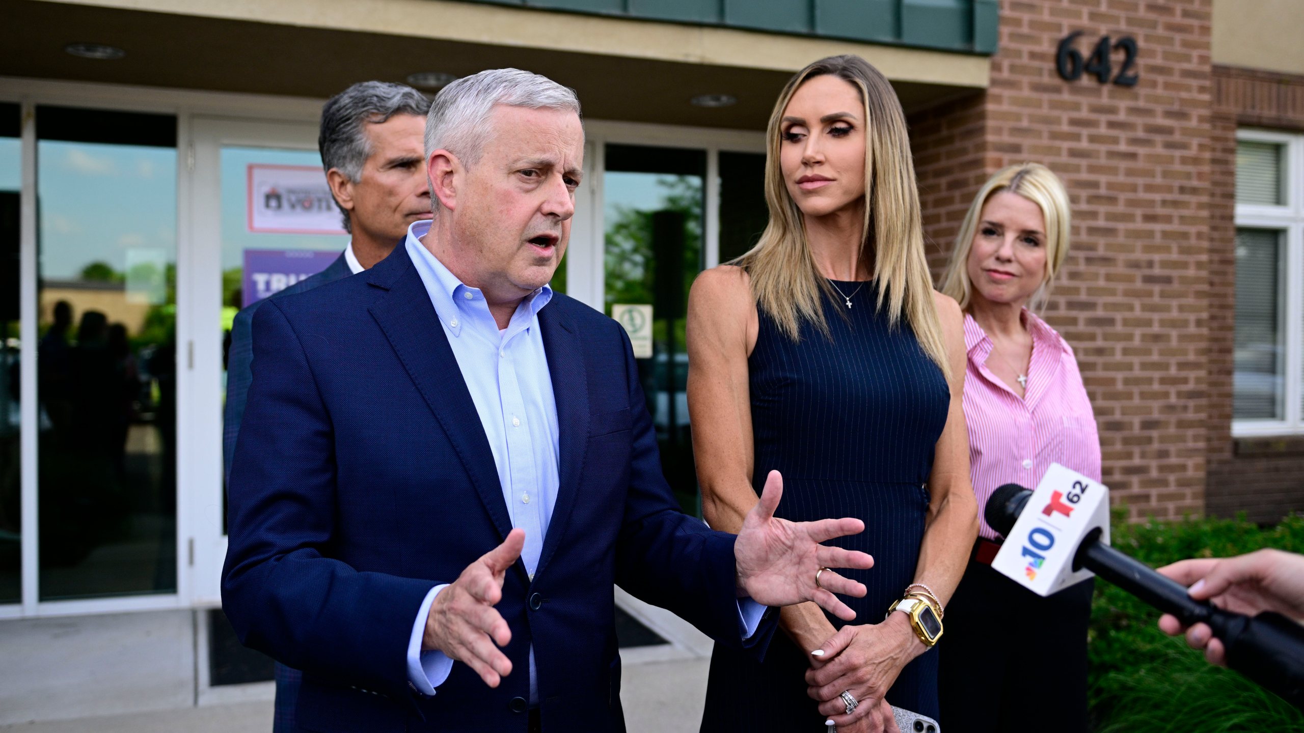 FILE - Republican National Committee Chairman Michael Whatley, left, and Co-Chair Lara Trump answer questions from the media outside an election integrity volunteer training, Tuesday, June 18, 2024, in Newtown, Pa. (AP Photo/Derik Hamilton, file)