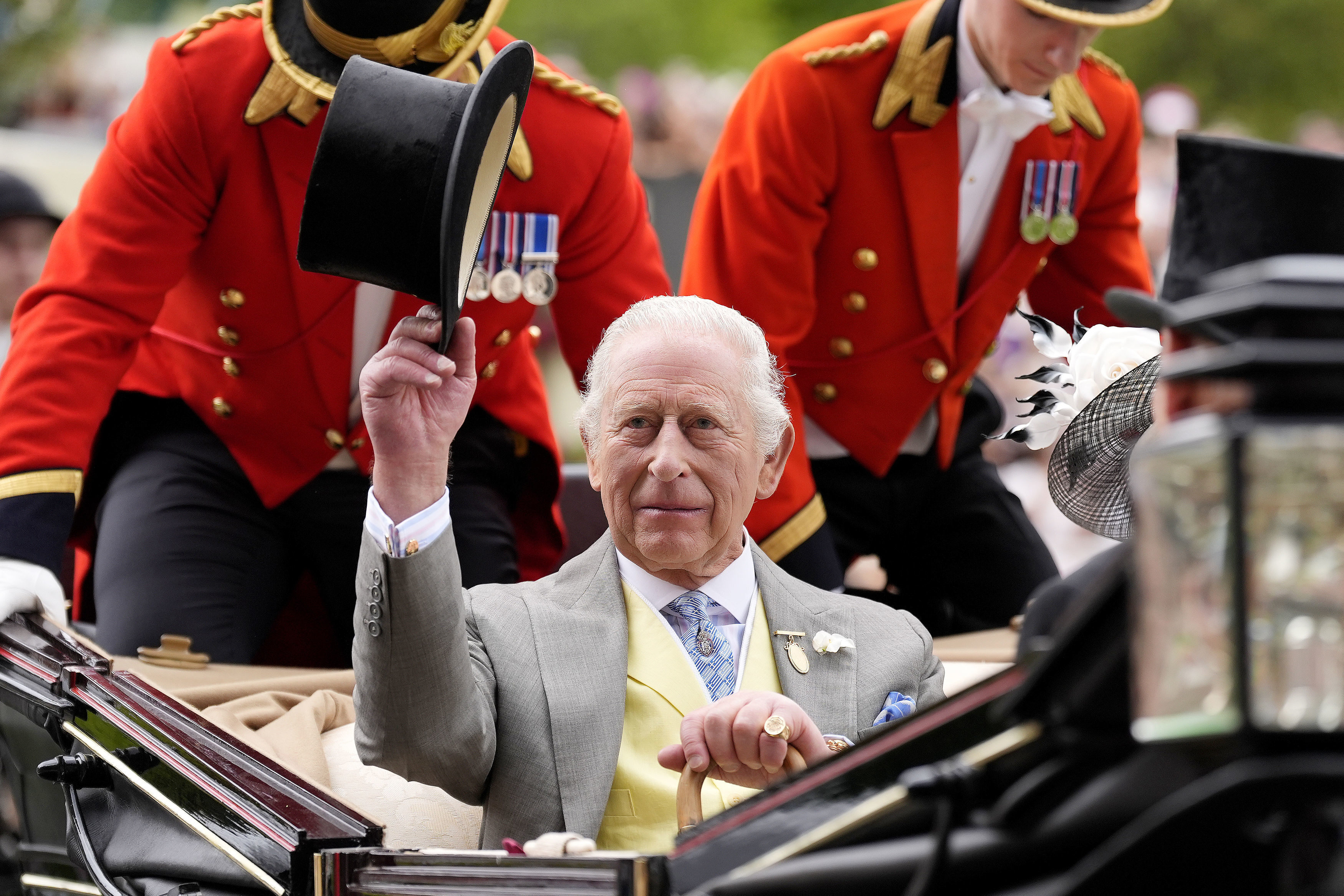 Britain's King Charles III arrives by royal carriage during day five of Royal Ascot at Ascot Racecourse, England, Saturday June 21, 2025. (Andrew Matthews/PA via AP)