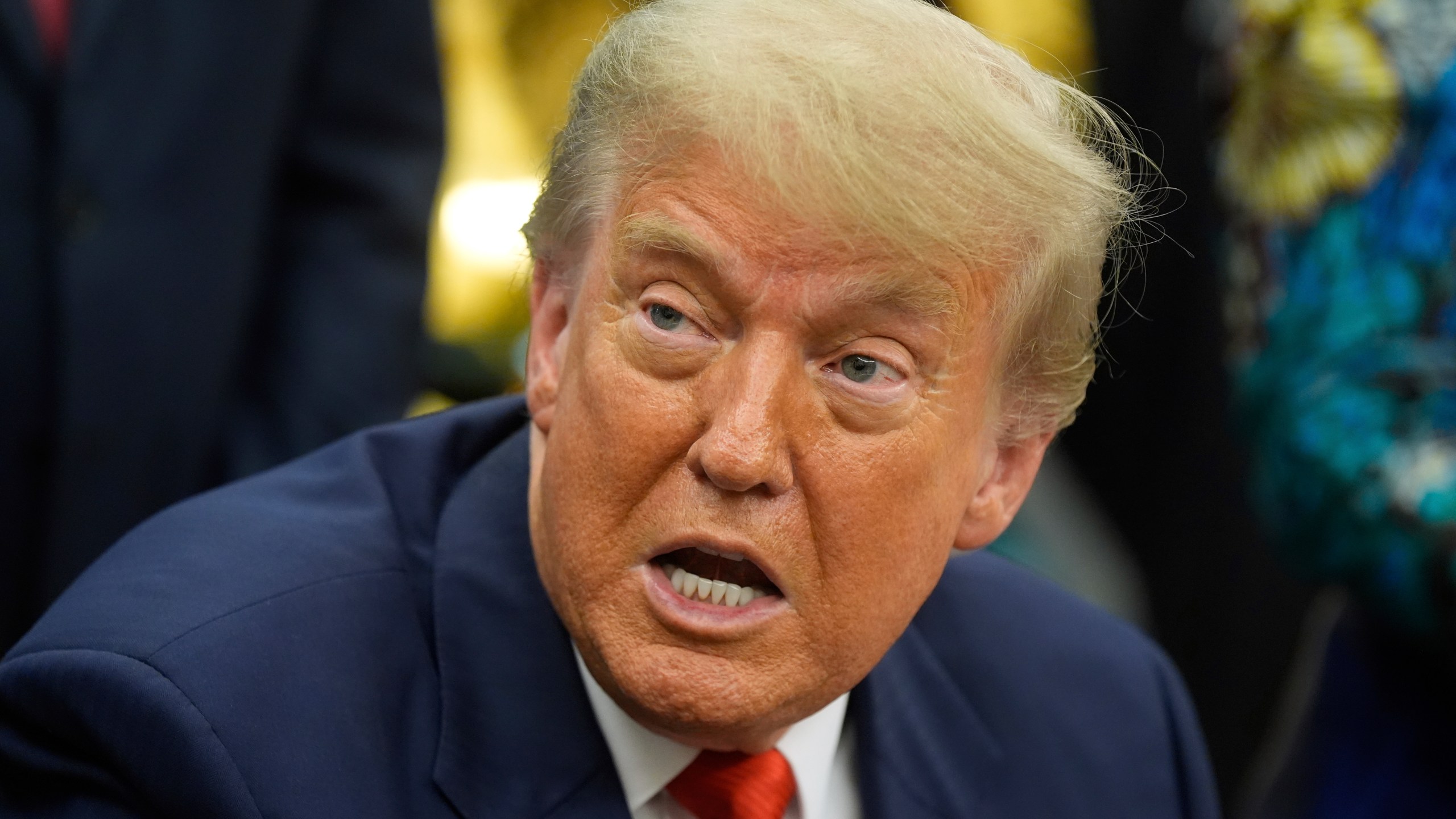 President Donald Trump answers questions from reporters as he meets with Congo's Foreign Minister Therese Kayikwamba Wagner, and Rwanda's Foreign Minister Olivier Nduhungirehe, Friday, June 27, 2025, in the Oval Office at the White House in Washington. (AP Photo/Manuel Balce Ceneta)