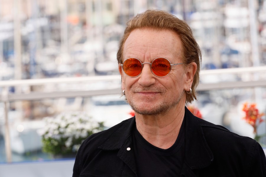 FILE - Bono poses for photographers at the 78th international film festival, Cannes, southern France, May 17, 2025. (Photo by Joel C Ryan/Invision/AP, File)
