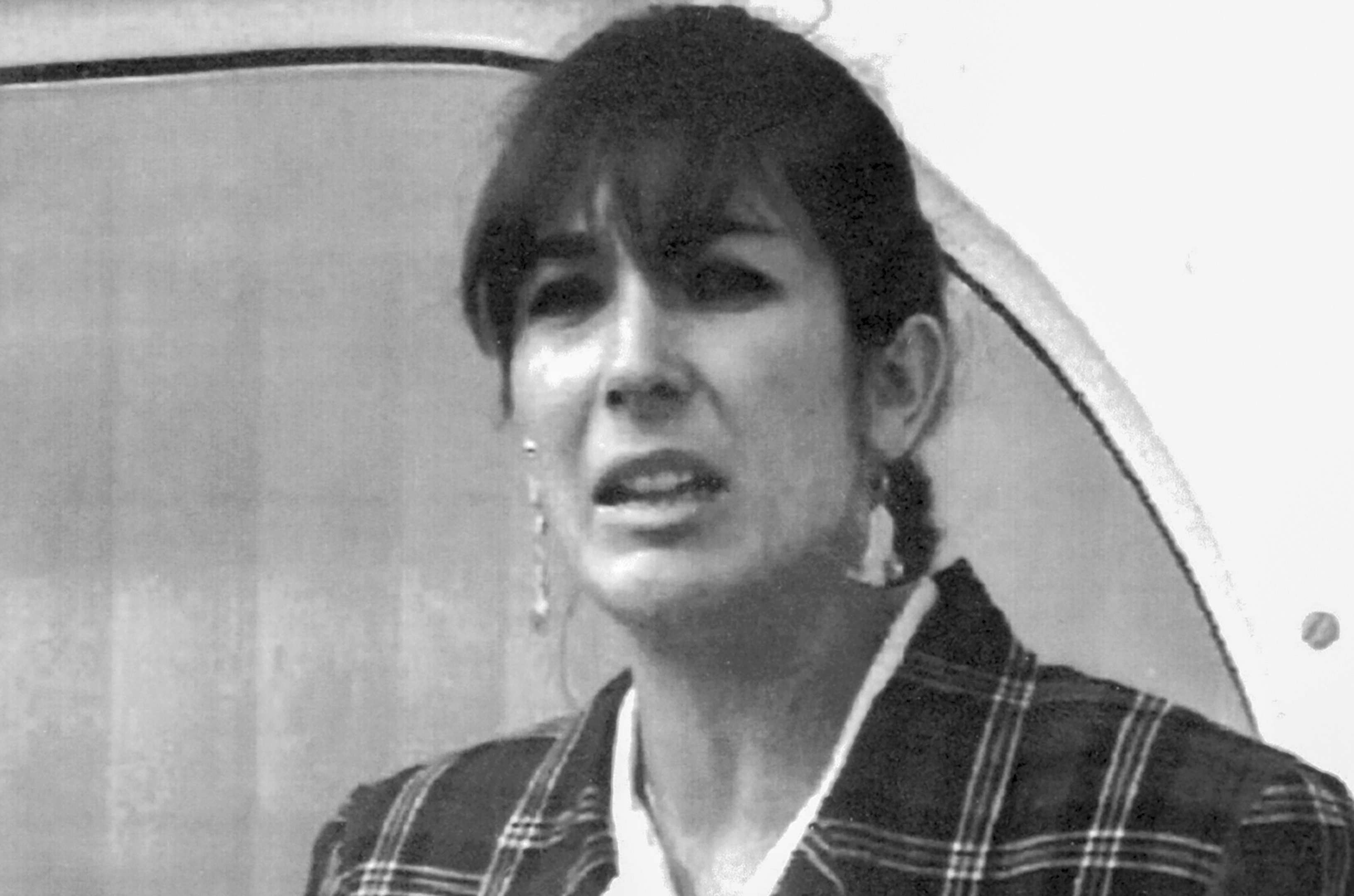 FILE - Ghislaine Maxwell, daughter of late British publisher Robert Maxwell, reads a statement expressing her family's gratitude to Spanish authorities after recovery of his body, Nov. 7, 1991, in Tenerife, Spain. (AP Photo/Dominique Mollard, File)