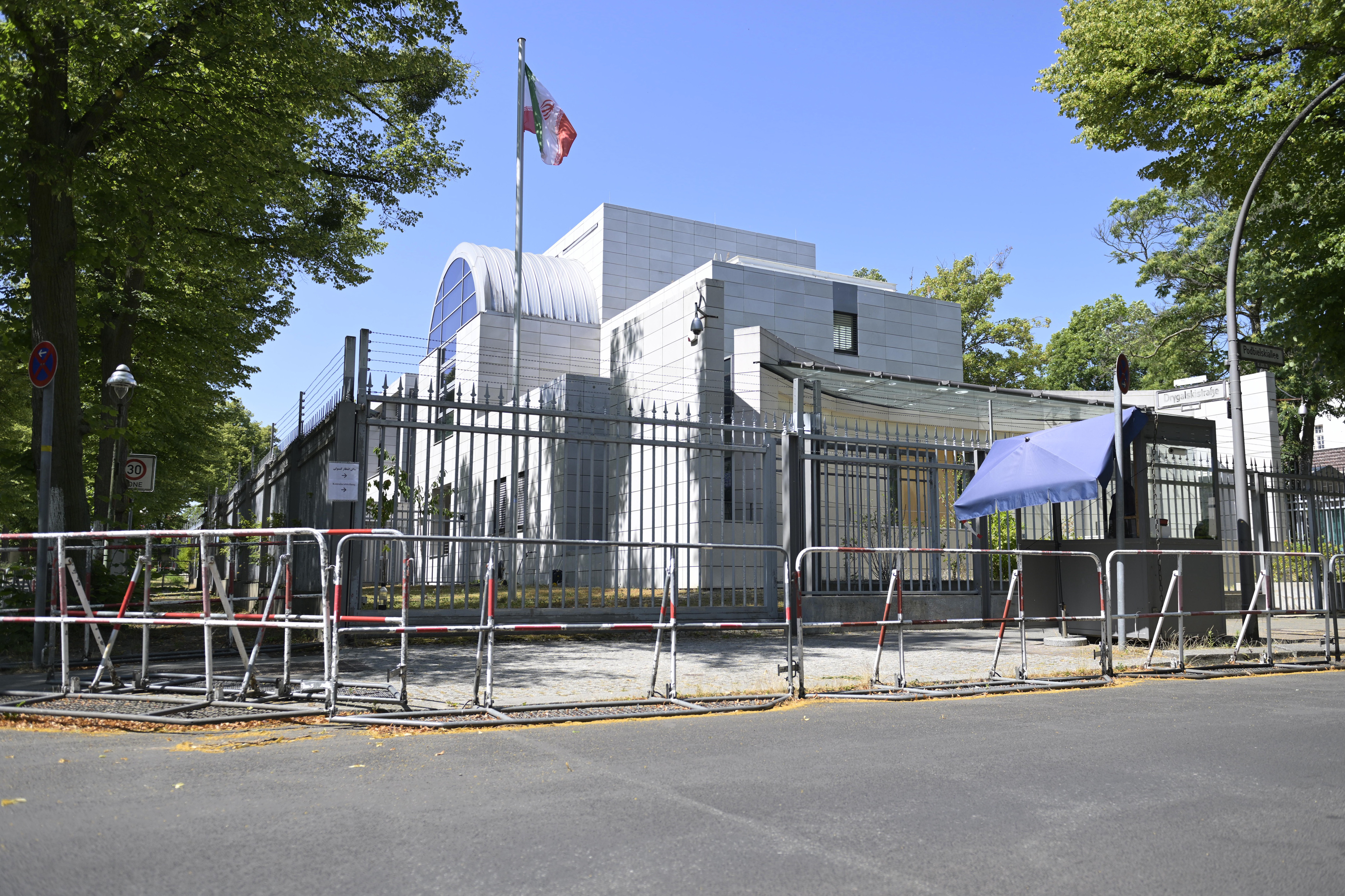 The Iranian flag flies in front of the Embassy of the Islamic Republic of Iran in Berlin, June 22, 2025. (Fabian Sommer/dpa via AP)