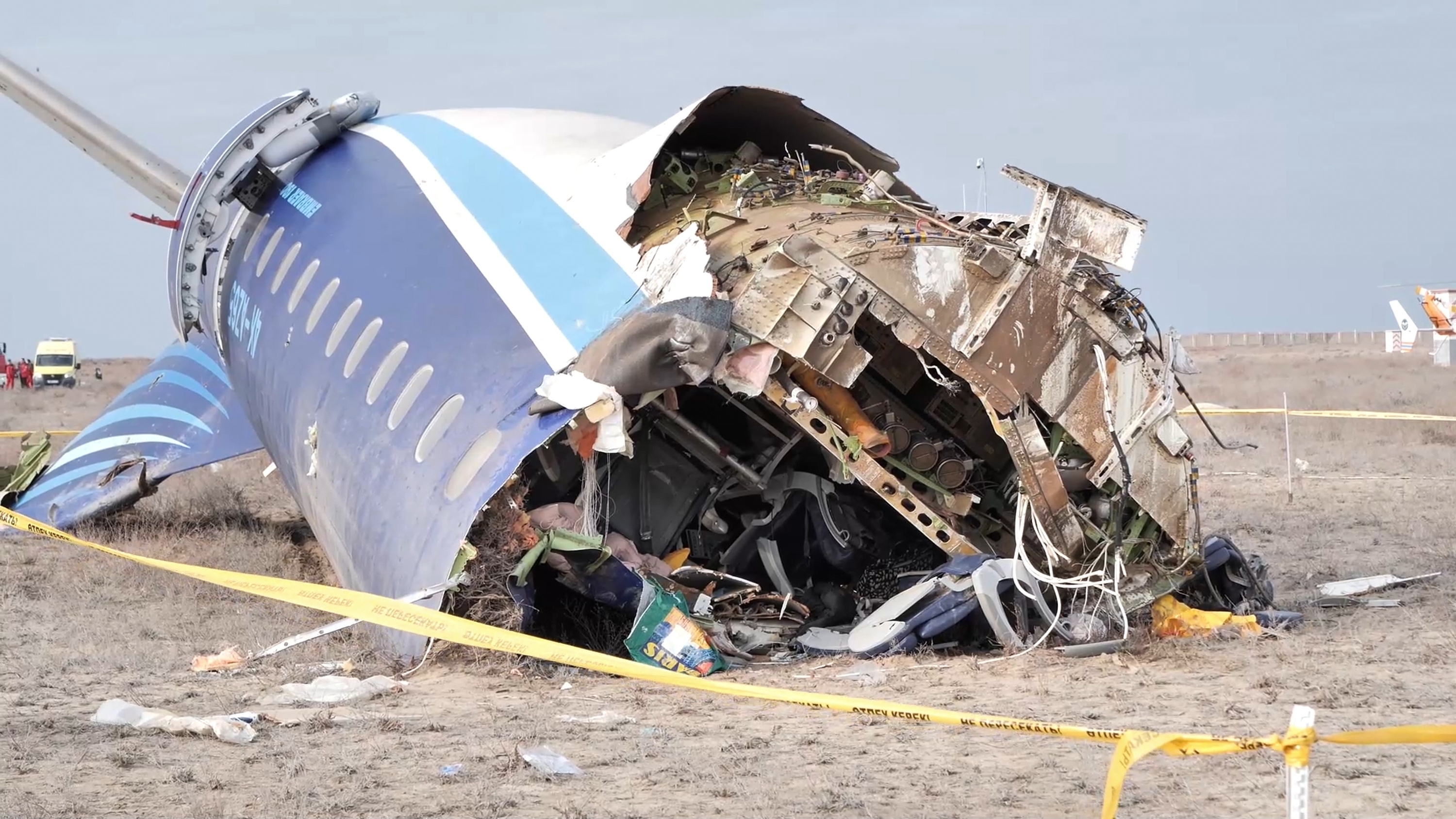 FILE - In this photo taken from a video released by The Administration of Mangystau Region, the wreckage of Azerbaijan Airlines Embraer 190 lies near the airport of Aktau, Kazakhstan, on Dec. 25, 2024. (The Administration of Mangystau Region via AP)