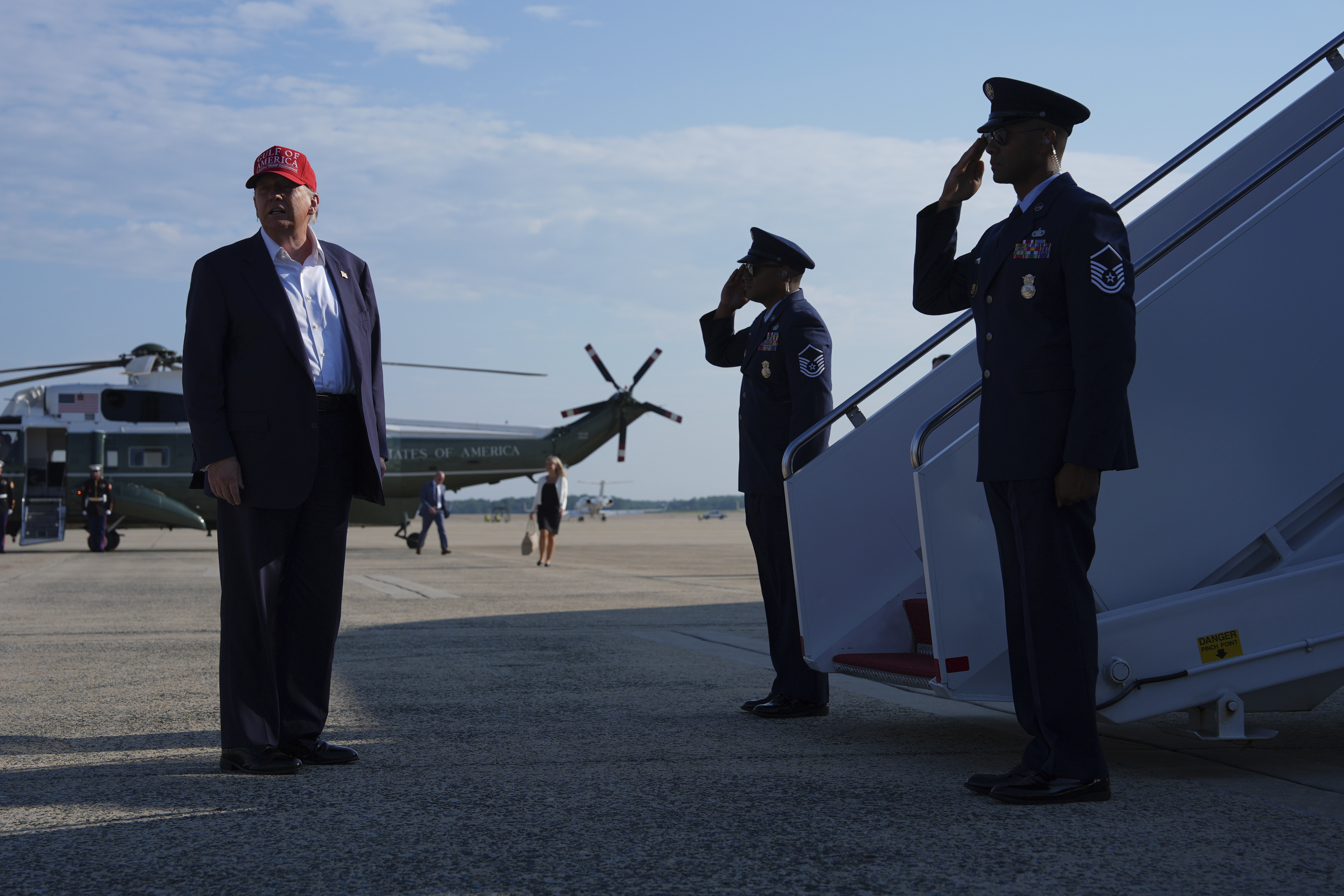 President Donald Trump boards Air Force One for a trip to visit a new migrant detention center in Ochopee, Fla., Tuesday, July 1, 2025, in Andrews Air Force Base, Md. (AP Photo/Evan Vucci)