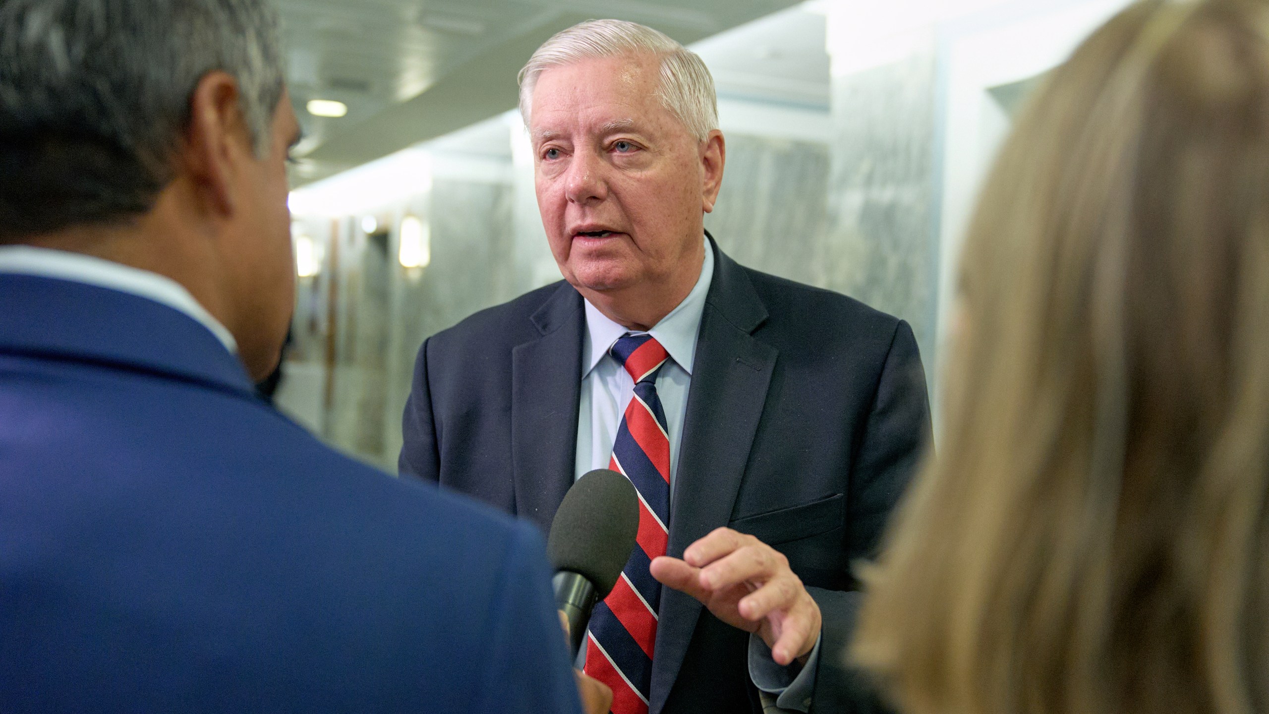 Sen. Lindsey Graham, R-S.C., speaks to reporters after a Senate Committee on Appropriations subcommittee on the Department of Defense hearing on budget estimates for the Navy, Tuesday, June 24, 2025, on Capitol Hill in Washington. (AP Photo/Jacquelyn Martin)