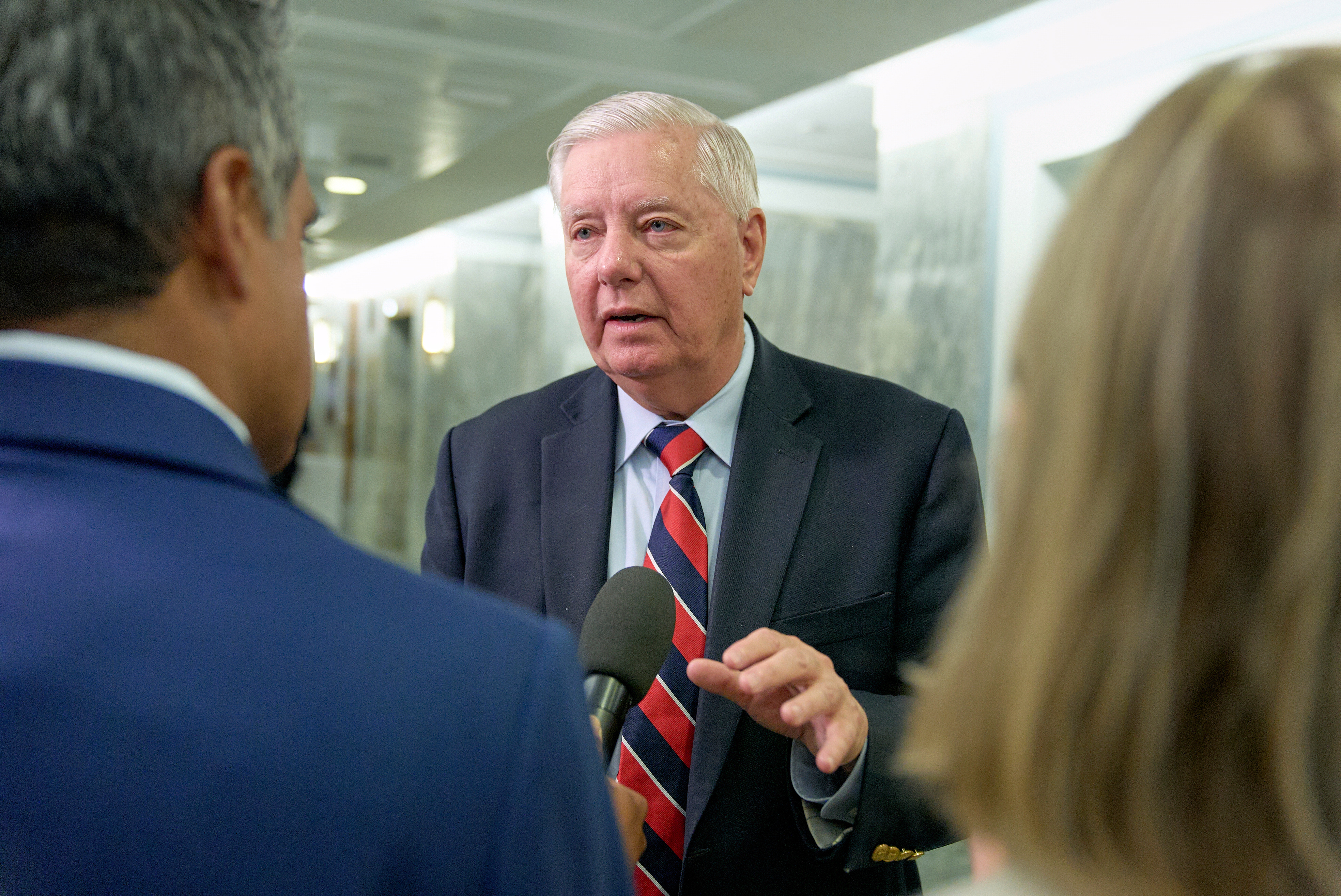 Sen. Lindsey Graham, R-S.C., speaks to reporters after a Senate Committee on Appropriations subcommittee on the Department of Defense hearing on budget estimates for the Navy, Tuesday, June 24, 2025, on Capitol Hill in Washington. (AP Photo/Jacquelyn Martin)