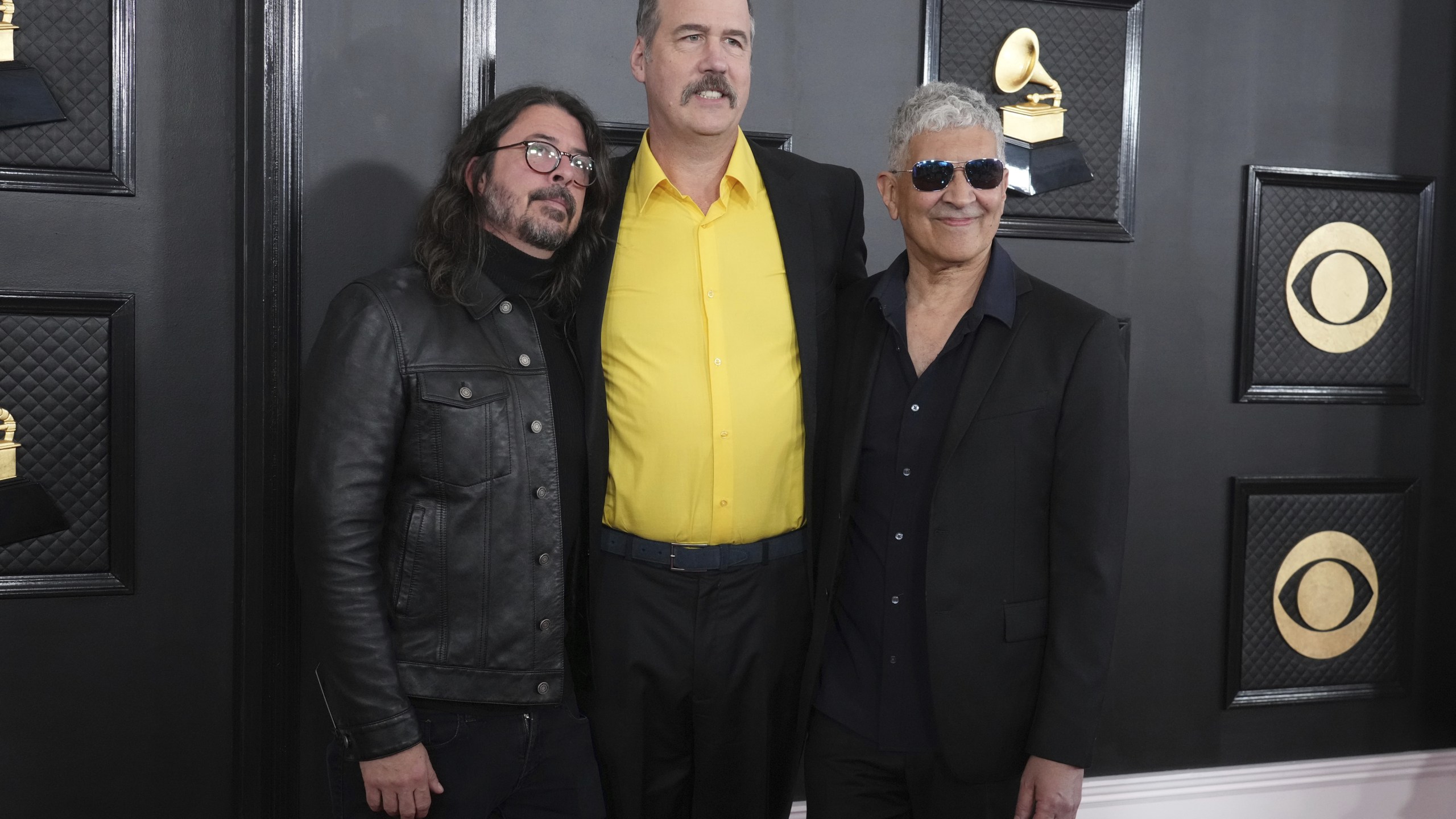 FILE - Dave Grohl, from left, Krist Novoselic, and Pat Smear of Nirvana appear at the 65th annual Grammy Awards on Feb. 5, 2023, in Los Angeles. (Photo by Jordan Strauss/Invision/AP, File)