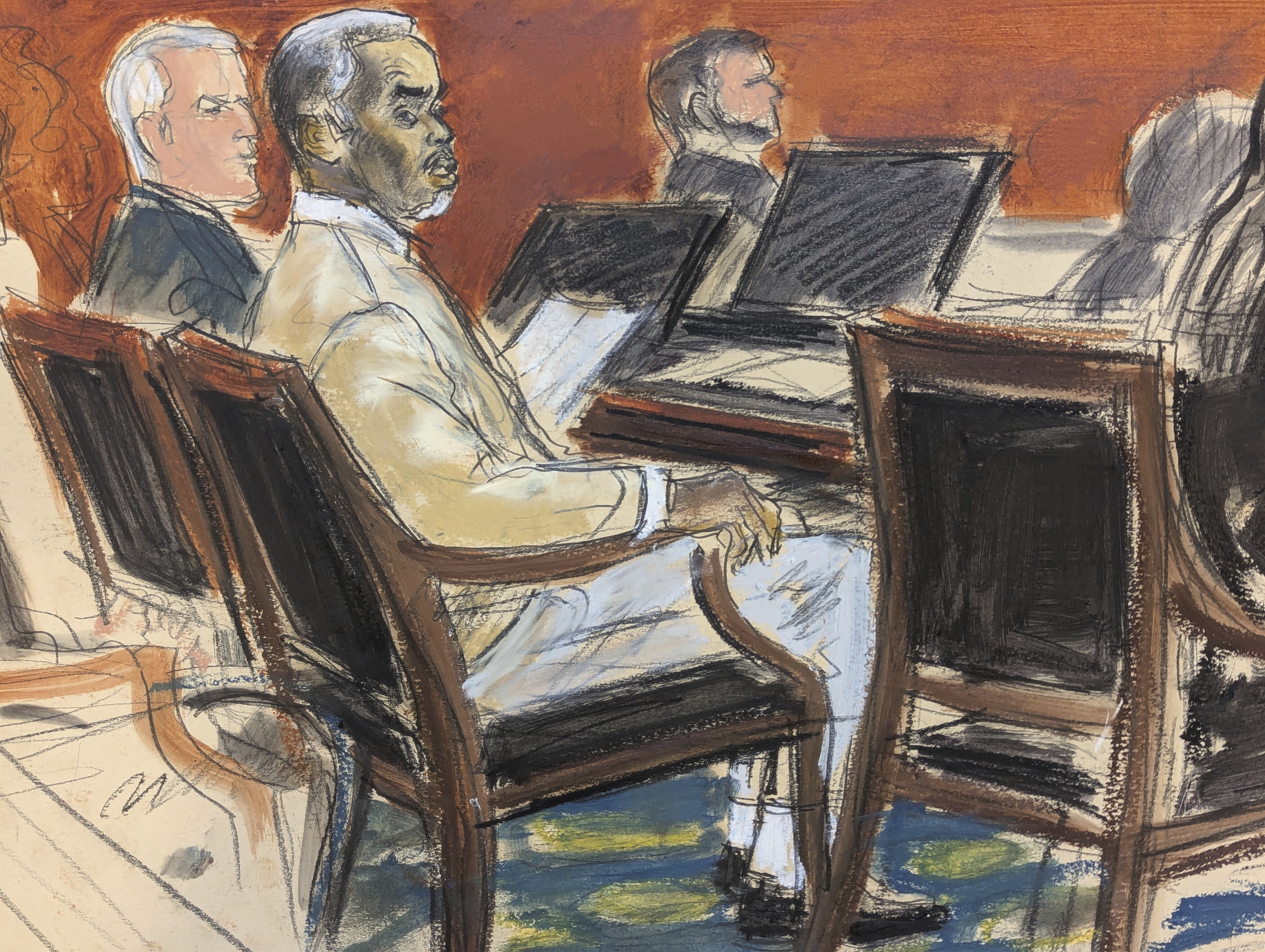 Sean ' Diddy' Combs, second from left, watches from the defense table as Judge Arun Subramanian speaks to the jury in Manhattan federal court, Tuesday, July 1, 2025, in New York. (Elizabeth Williams via AP)