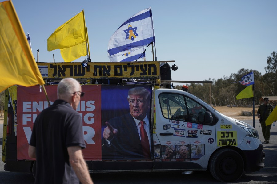 People take part in a protest demanding an end to the war and the immediate release of hostages held by Hamas in the Gaza Strip, at the site of the October 7, 2023 Hamas attack on the Nova music festival near Kibbutz Reim, southern Israel, Wednesday, July 2, 2025. (AP Photo/Ohad Zwigenberg)