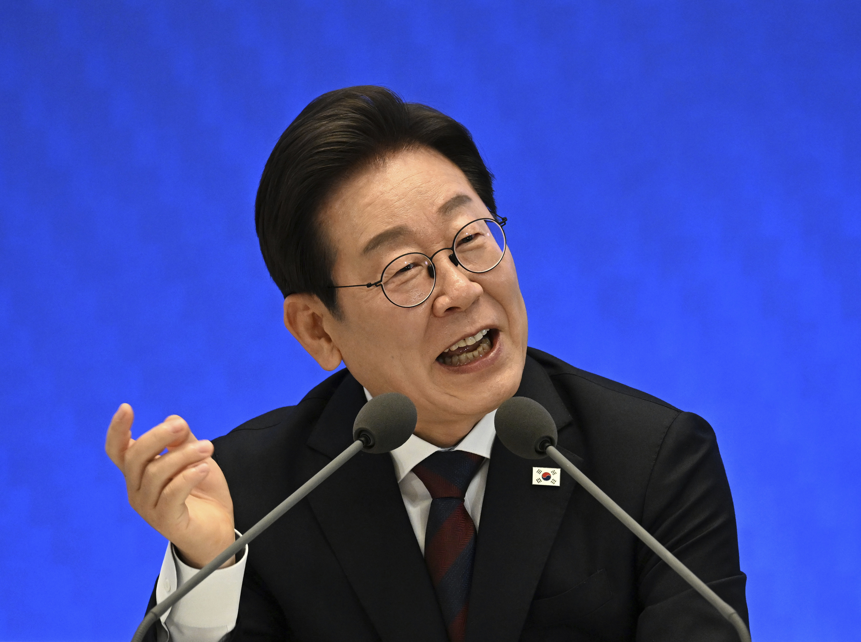 South Korean President Lee Jae-myung delivers a speech during a news conference to mark his first 30 days in office at Yeongbingwan of Blue House in Seoul, South Korea, Thursday, July 3, 2025. (Kim Min-Hee/Pool Photo via AP)
