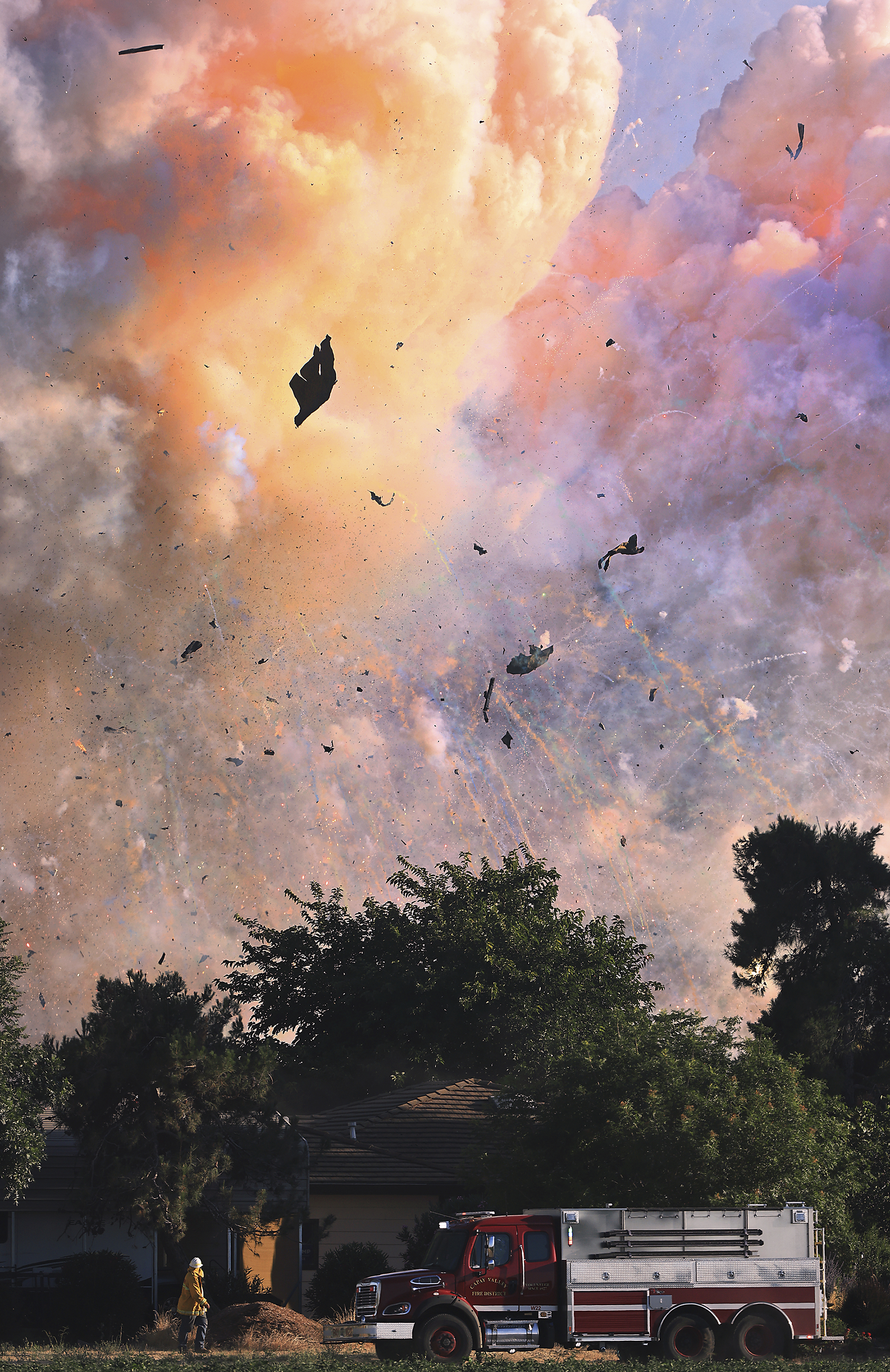 Fireworks explode at a fireworks warehouse near Esparto, Calif., Tuesday, July 1, 2025. (Kent Porter/The Press Democrat via AP)