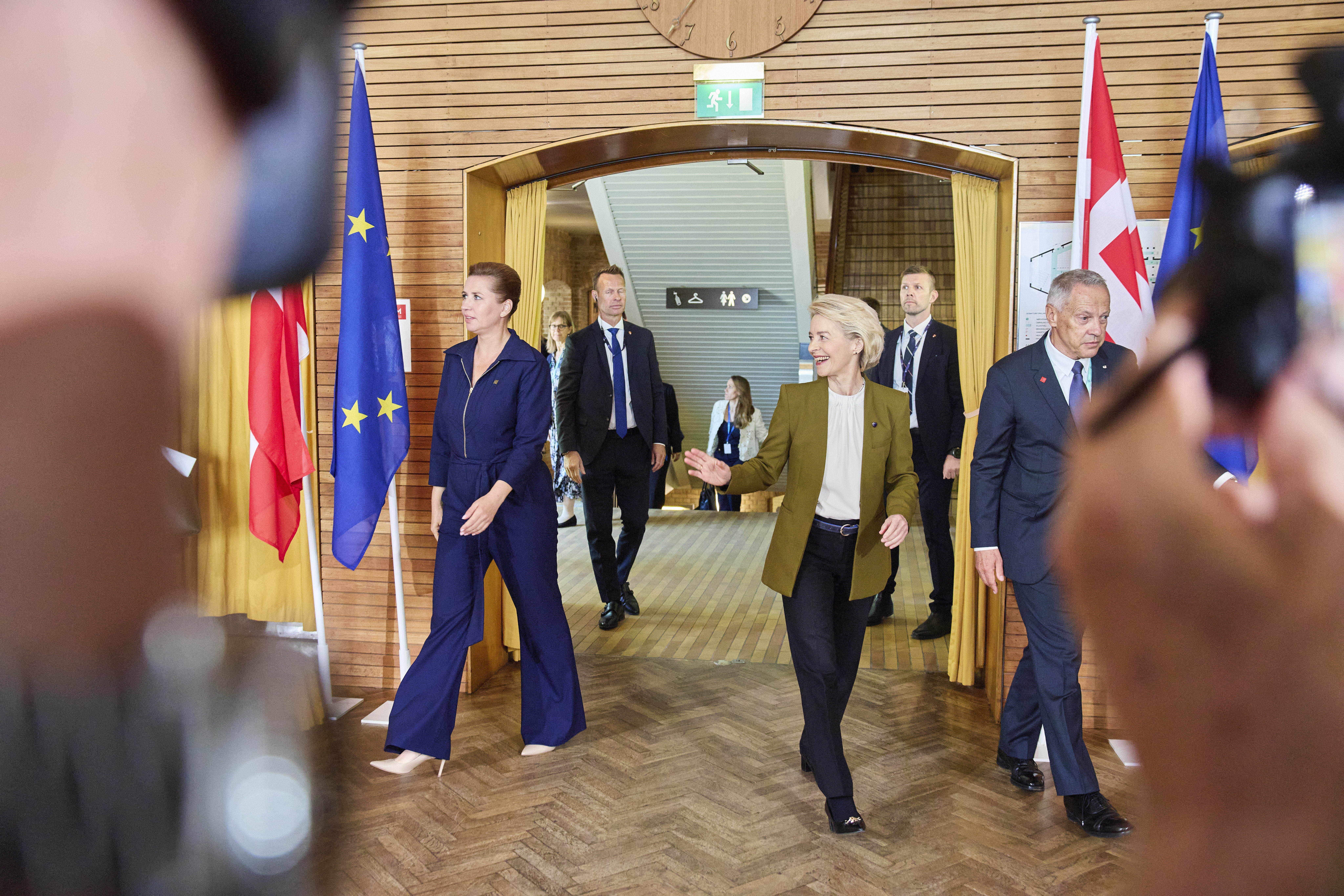 Danish Prime Minister Mette Frederiksen, centre left, and President of the European Commission Ursula von der Leyen arrive for a round table at Aarhus University in Aarhus, Denmark, Thursday, July 3, 2025, as Denmark officially takes over the EU presidency. (Mikkel Berg Pedersen/Ritzau Scanpix via AP)