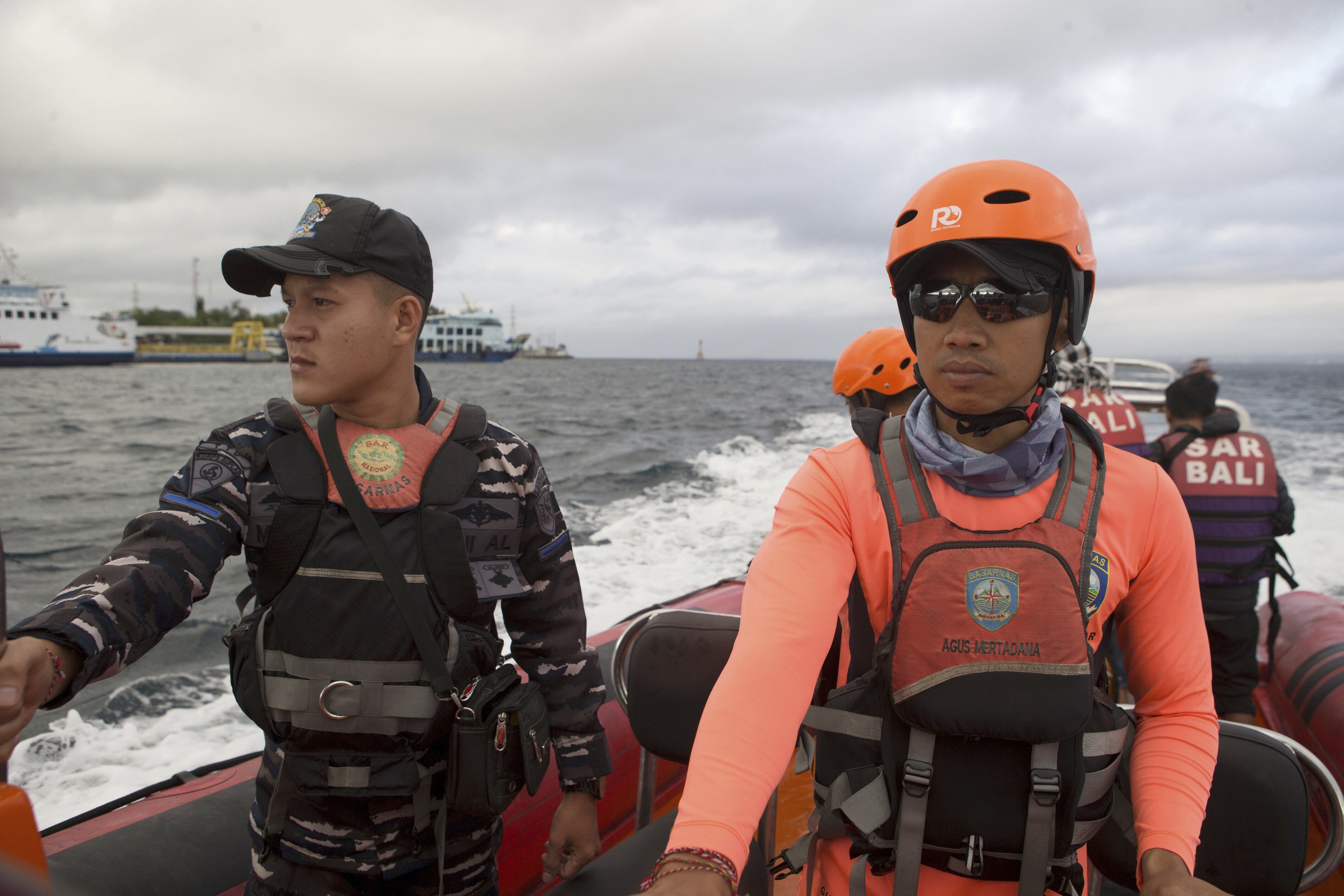Rescuers search for victims after a ferry sank in the waters off Jembrana, Bali, Indonesia, Friday, July 4, 2025. (AP Photo/Firdia Lisnawati)