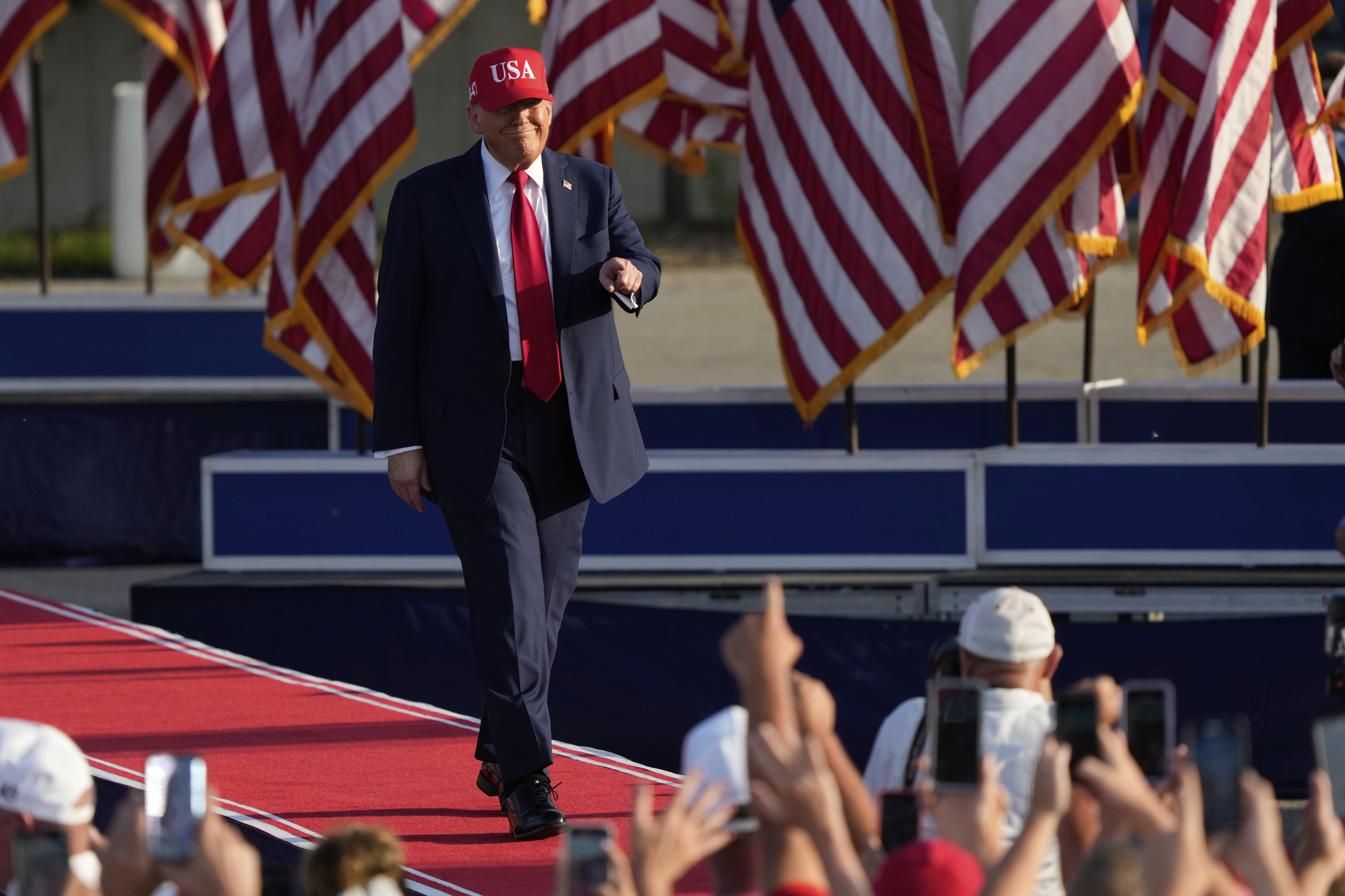 President Donald Trump arrives to speak at a rally at the Iowa State Fairgrounds, Thursday, July 3, 2025, in Des Moines, Iowa. (AP Photo/Charlie Neibergall)
