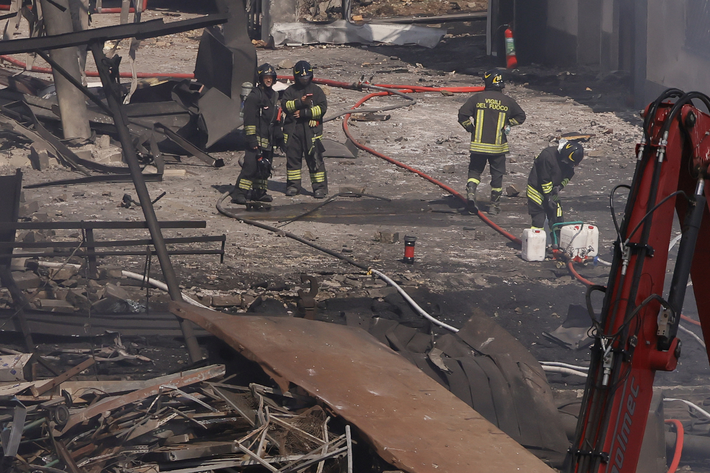 Firefighters at the scene of an explosion at a gas station in Rome, Italy, Friday, July 4, 2025. (Cecilia Fabiano/LaPresse via AP)