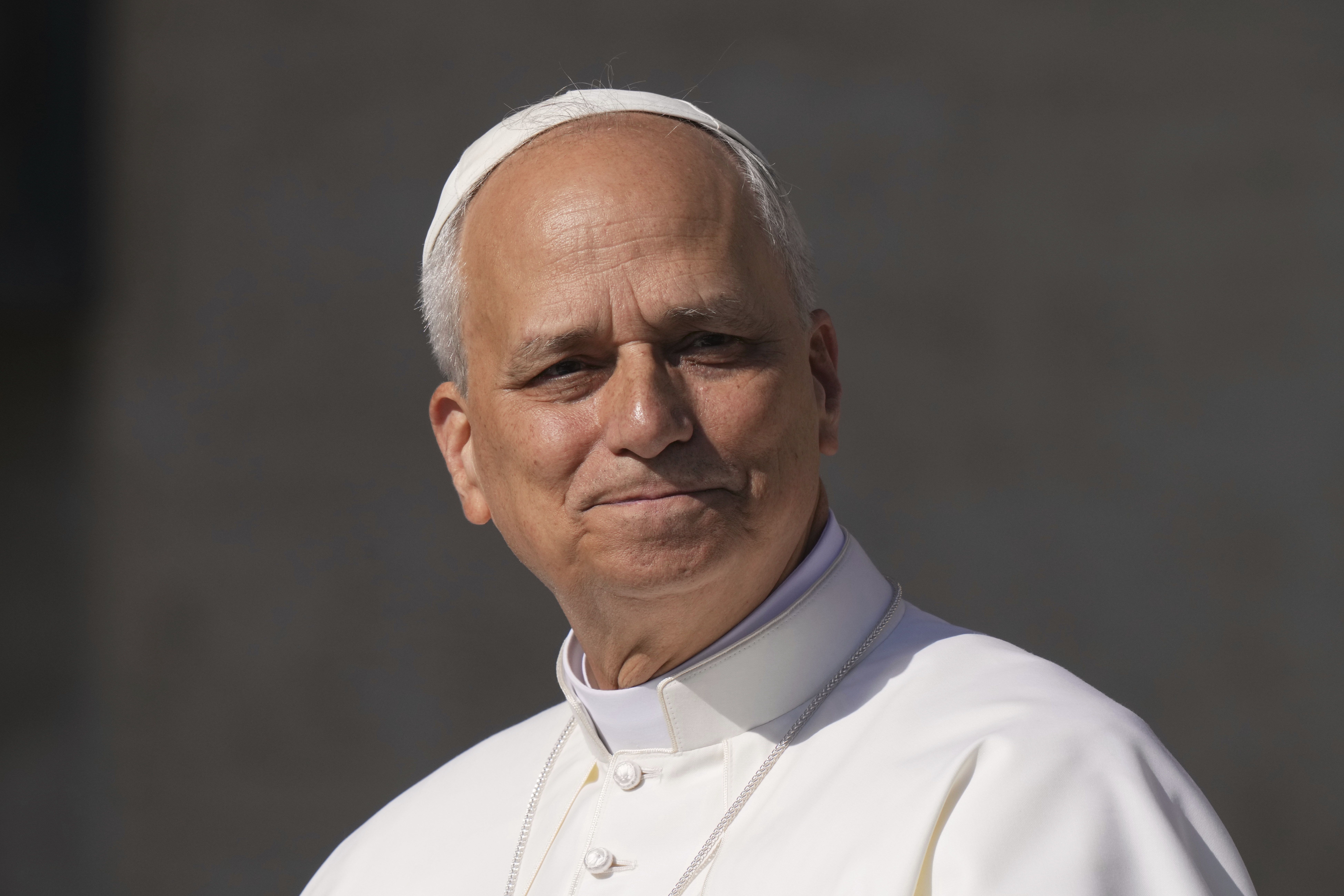 FILE - Pope Leo XIV arrives in St. Peter's Square to hold his weekly general audience, at the Vatican, Wednesday, June 25, 2025. (AP Photo/Andrew Medichini, File)