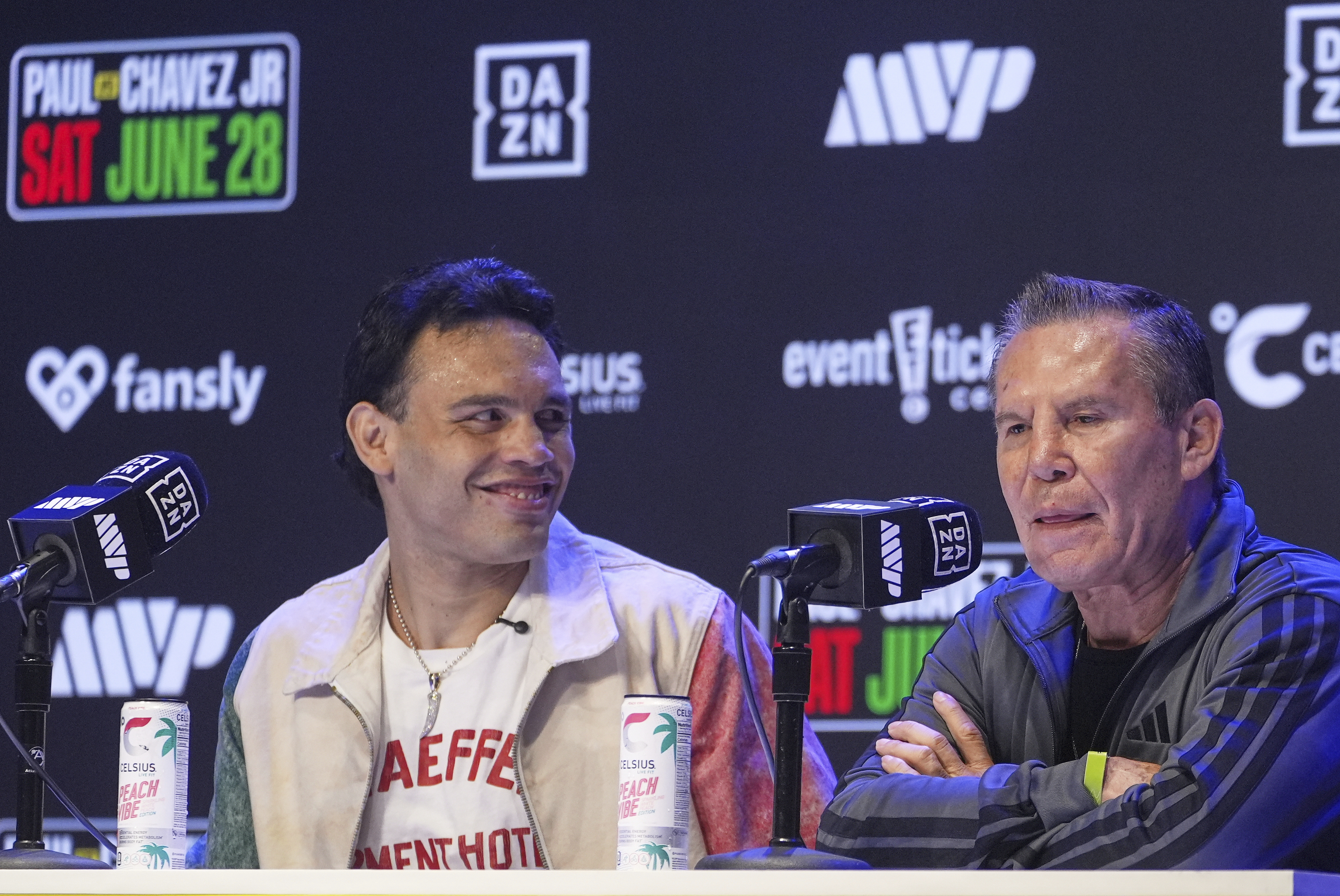 FILE - Boxers Cesar Chavez Jr,, left, smiles towards his father Julio Cesar Chavez, Mexico's former world champion, during a boxing news conference at the Avalon Hollywood Theatre in Los Angeles, May 14, 2025. (AP Photo/Damian Dovarganes, File)