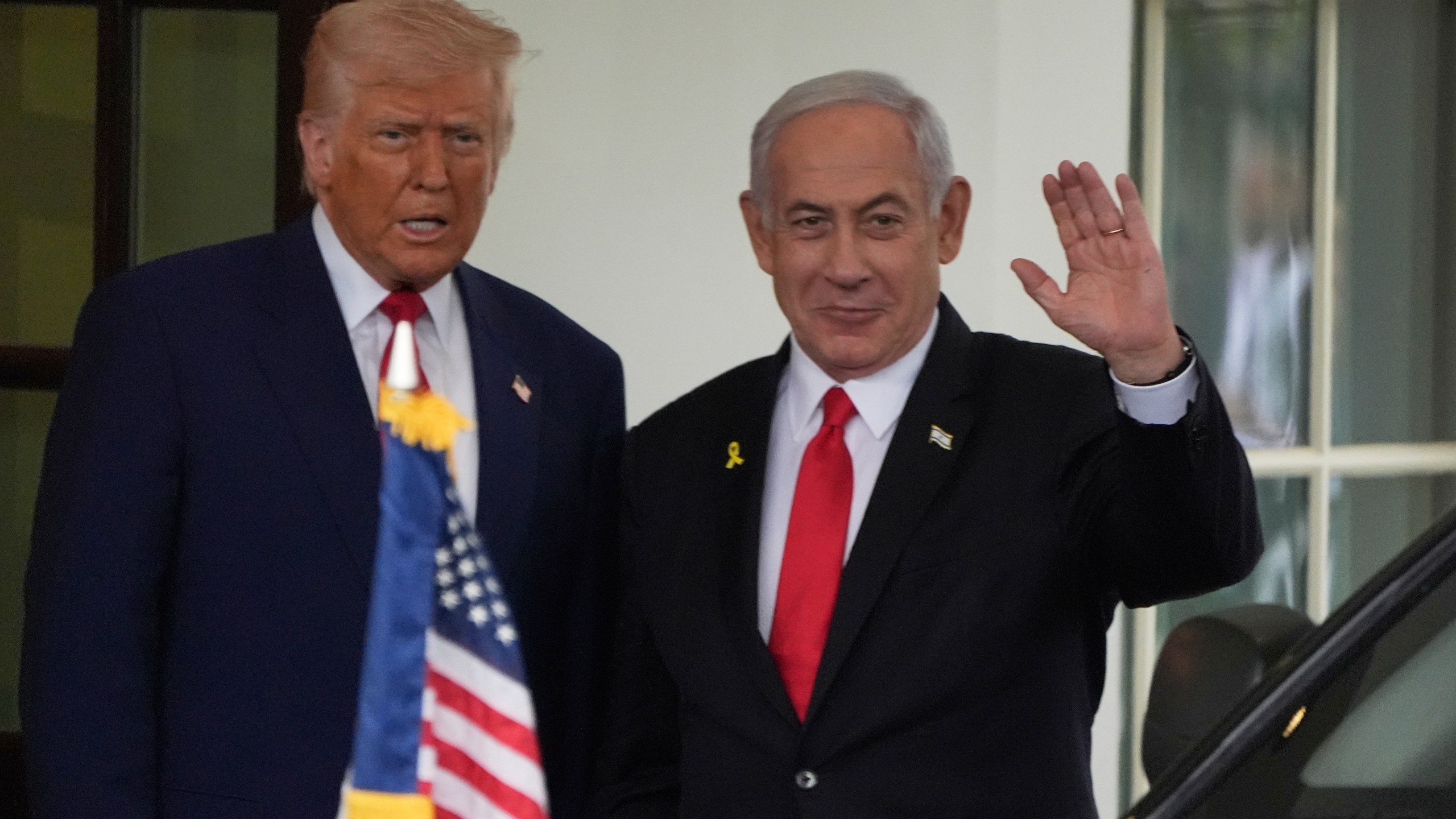 FILE - Israel's Prime Minister Benjamin Netanyahu, right, is greeted by President Donald Trump as he arrives at the West Wing of the White House in Washington, April 7, 2025, in Washington. (AP Photo/Mark Schiefelbein, File)