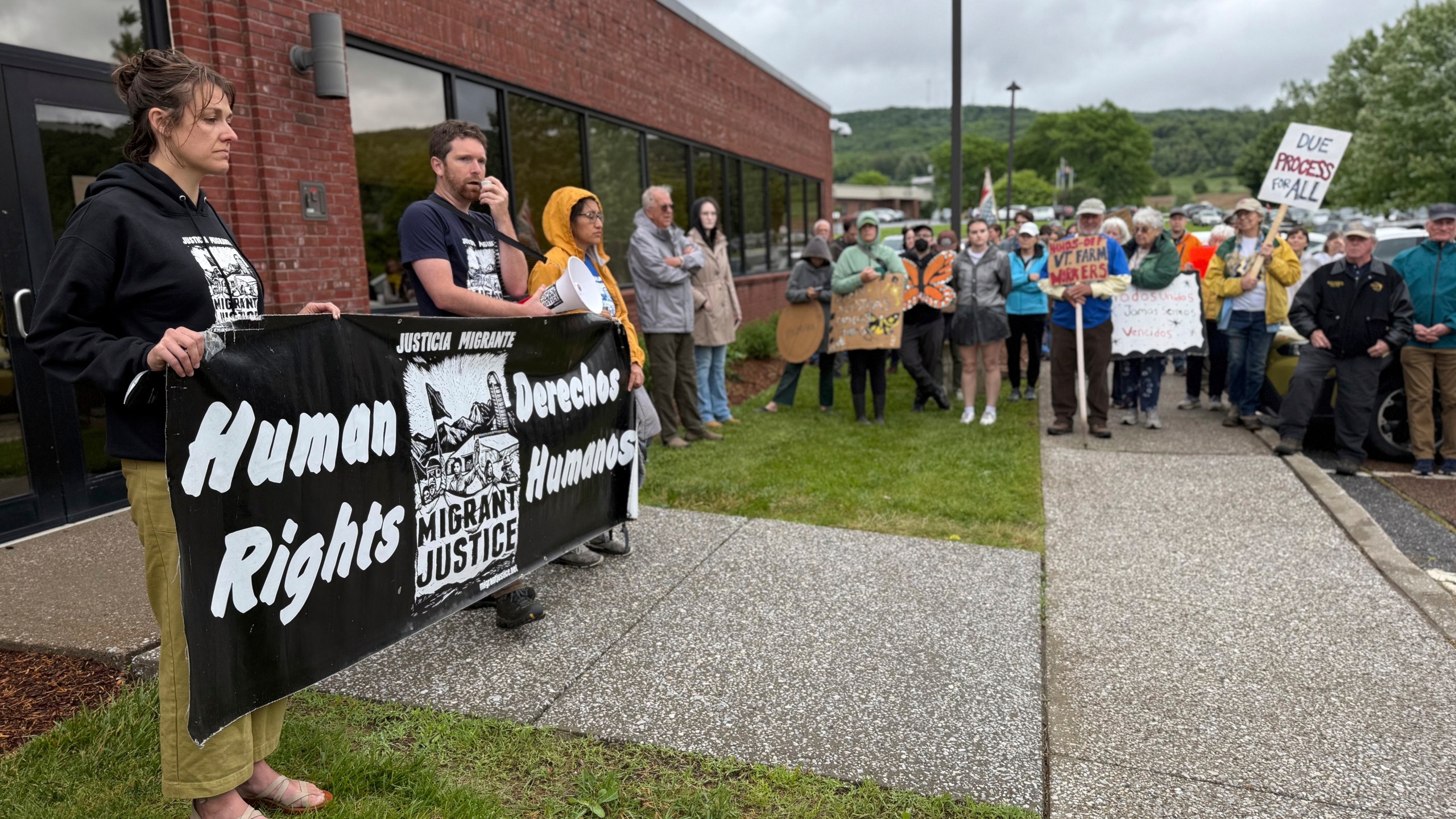 Protesters hold a rally outside a U.S. Immigration and Customs Enforcement office in St. Albans, Vt., on Friday, June 20, 2025, in support of Wuendy Bernardo, a migrant dairy farmworker at risk of deportation. (AP Photo/Amanda Swinhart)